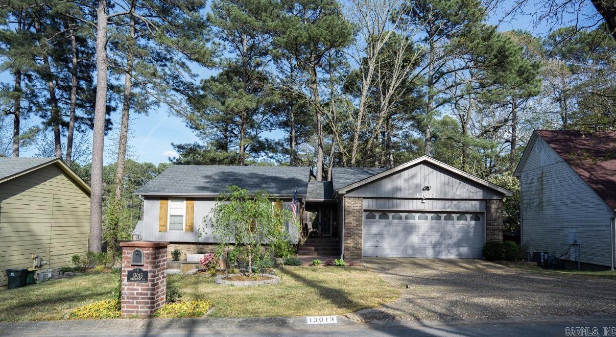 Beautifully renovated home in the heart of Central Arkansas. This home boasts so much space for you and your family to spread out with a shop, large storage room and safe room, not included in the square footage. Upon entering the home you will find a stunning brand new front patio for all your front porch sittin' dreams! The living room invites you into a custom world of all things new and modern. The kitchen and separate dining has the luxury feel with custom cabinets and soft close cabinets and drawers. Upstairs holds 3 bedrooms, including the primary suite and 2 full bathrooms. Downstairs is a whole other living space with 1 bedroom, full size bathroom, family room with fireplace, the shop, storage room, and safe room. I must mention the amazing clubhouse, multiple pools, pickleball courts and walking trails for you to enjoy as a member of this wonderful community! You do not want to miss out on this opportunity. Move in ready May 7th! Call today to schedule your appointment. (agent see remarks for list of updates)