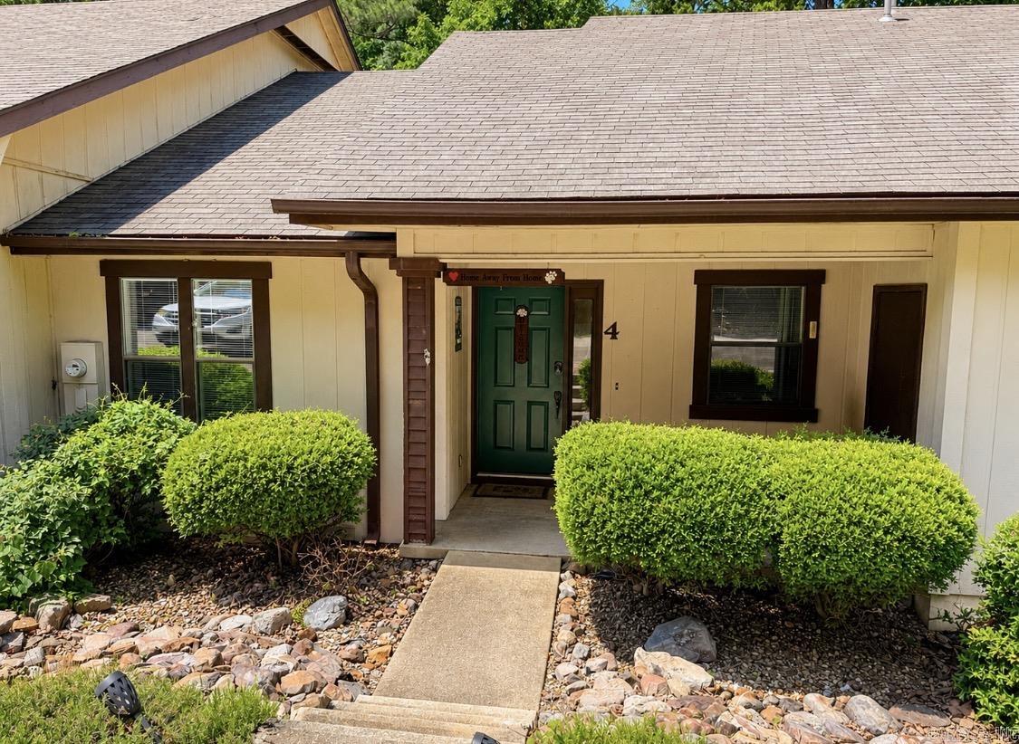 Open House Saturday, May 30th 10 - 12:00pm!!! Beautifully maintained and move-in ready, this 2 bed, 2 bath condo in Hot Springs Village offers comfort, convenience, and investment potential. The open living, dining, and kitchen layout creates an inviting space for relaxing or entertaining, while a cozy breakfast nook is perfect for morning coffee with peaceful wooded views. The split-bedroom floor plan provides privacy, with two spacious bedrooms and bathrooms ideal for guests, full-time living, or rental flexibility. Large windows bring in natural light throughout, and the private deck offers a quiet place to enjoy the surrounding nature. Recent updates include a new roof and a newly rebuilt and serviced air conditioning unit for low-maintenance living. Refrigerator conveys. Located just 2 minutes from the Calella Road area with dining, gas, and essentials nearby and only a few minutes from multiple golf courses. With continued growth in Hot Springs Village, this property is a great option for investors or homeowners and qualifies for Rural Development. Move-in ready opportunities like this go quickly—don’t miss it!
