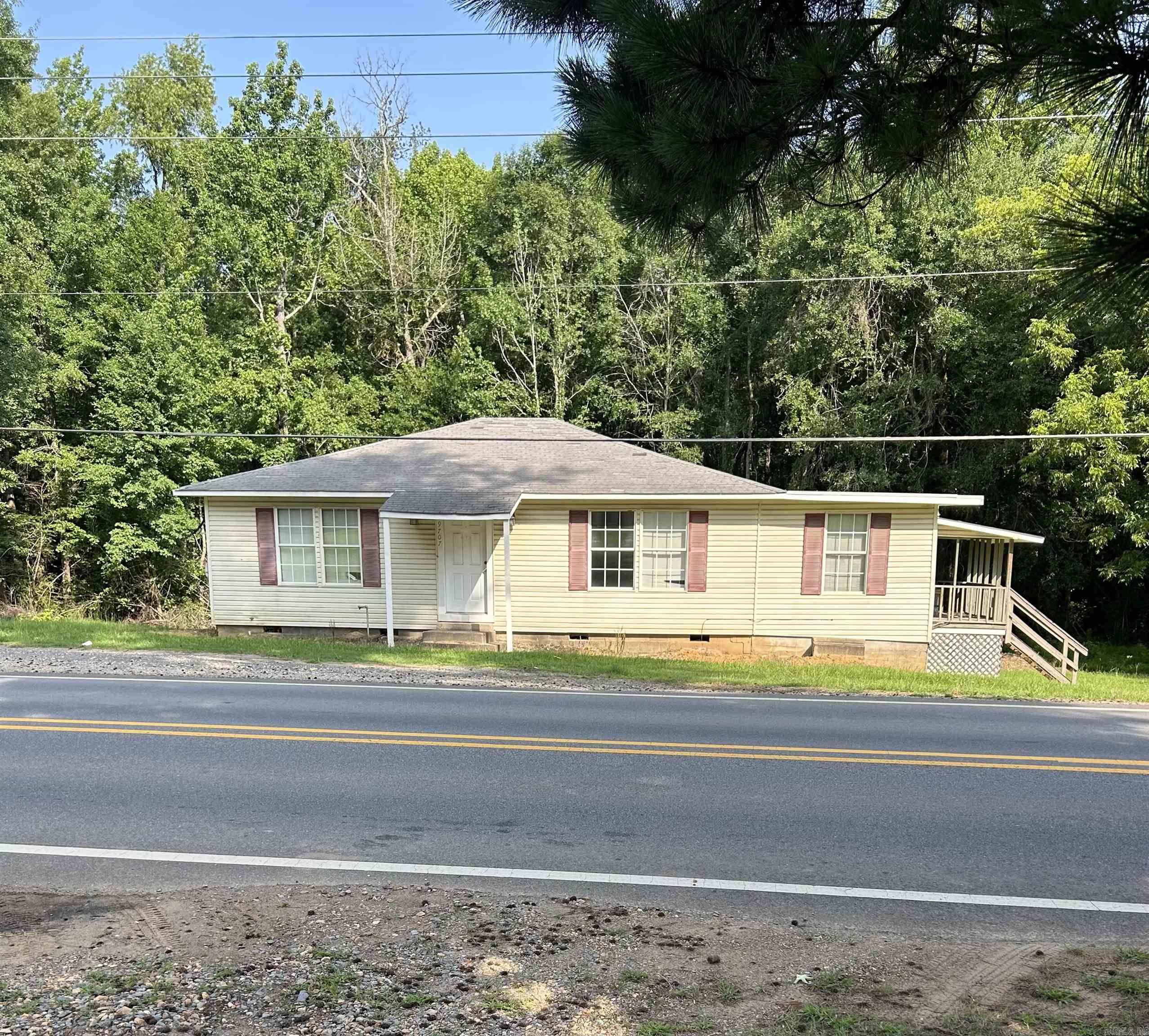 Great commercial property ** house needs a lot of repairs ** utilities on property can be any type of business ** great for office