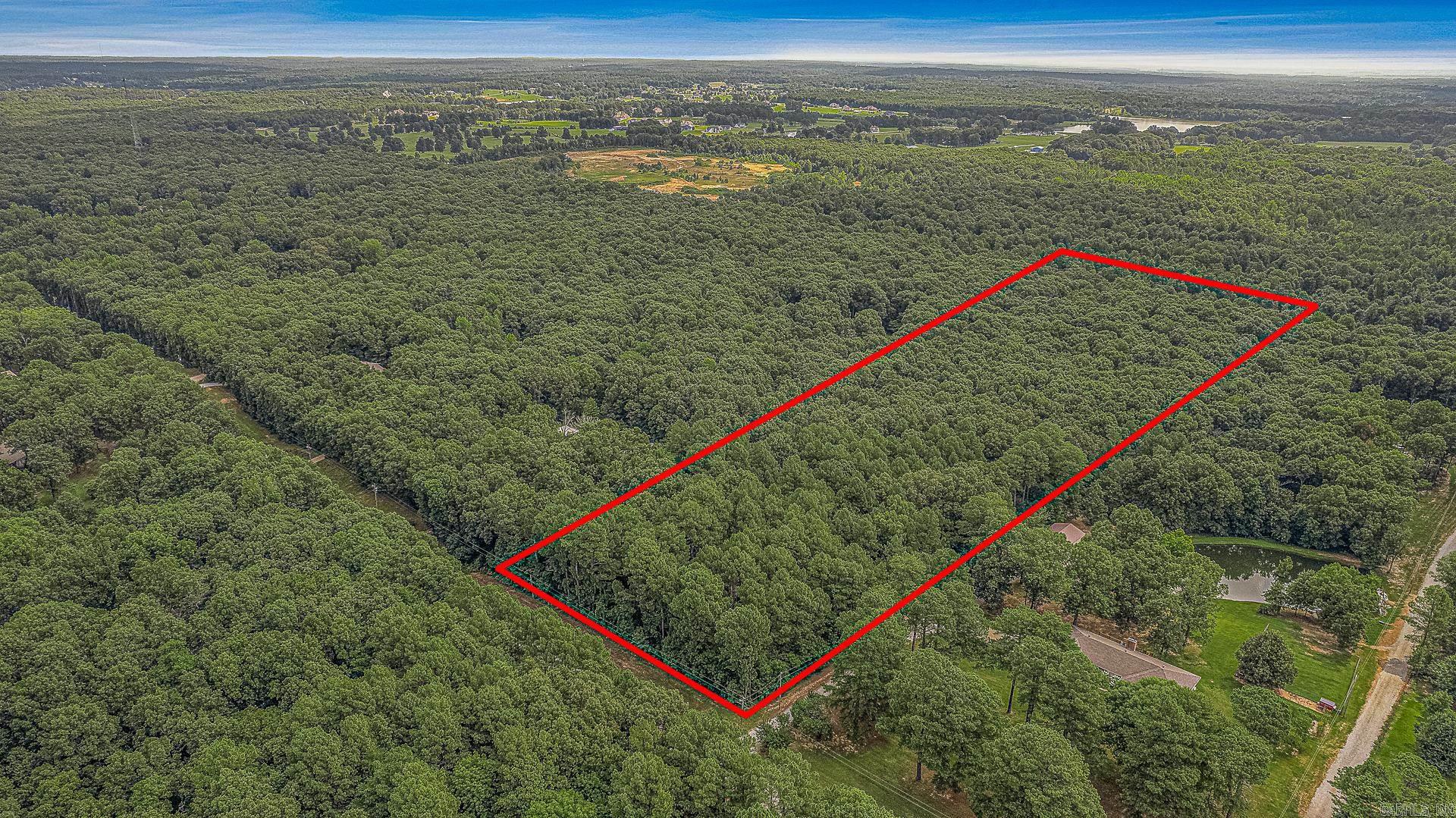 Build your dream home on this beautiful 9.5-acre wooded tract nestled on Rolling Ridge Road in the highly desirable Brookland School District. Featuring gently rolling hills and mature trees, this property offers the perfect setting for a private, secluded homesite while still being just minutes from the conveniences of town. Whether you're looking to create a peaceful country retreat or your forever home, this acreage provides the ideal combination of privacy, natural beauty, and an excellent location. No restrictions. Property will need a new perc test/septic permit based on the buyer's plan for the property.