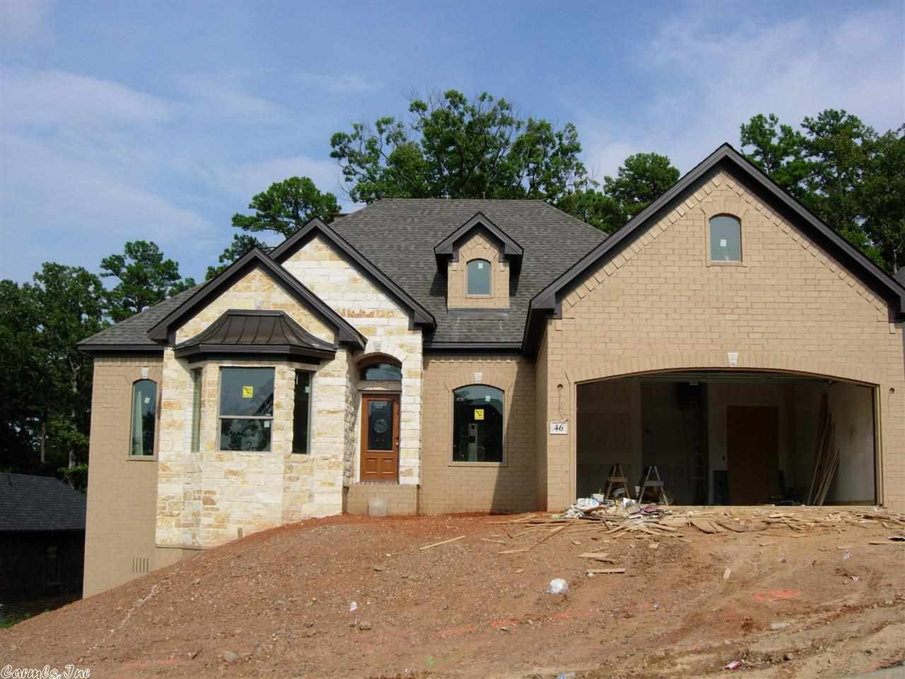 New construction, one level, painted brick and stone home. Hardwoods in main areas, carpet in BR's and tile in baths.  Open plan with vaulted ceiling in greatroom. Formal dining room. 4th BR could be used as an office. Great home for entertaining.