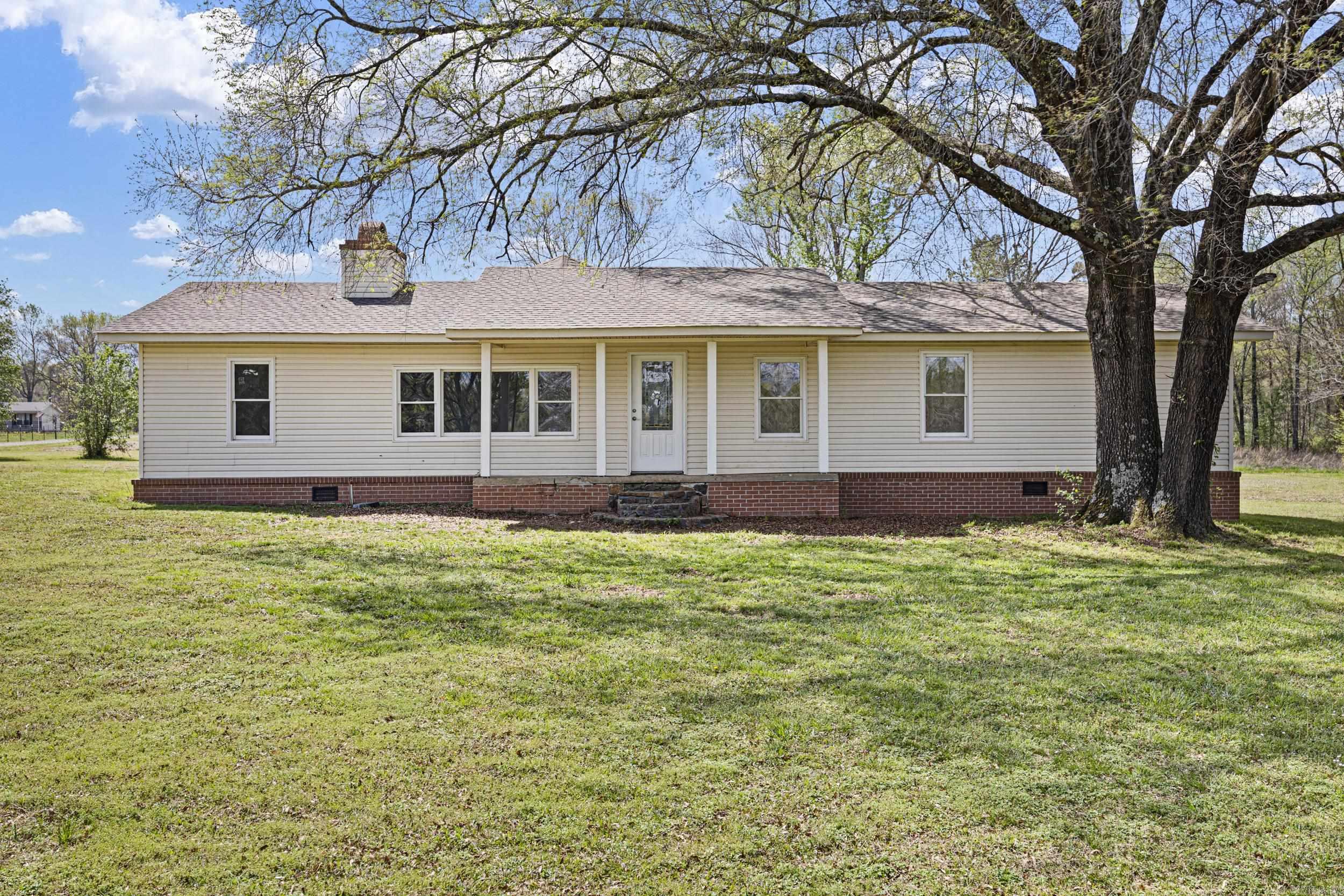 Welcome to 31 Crooked Pine in Morrilton! This beautifully updated 3-bedroom, 2-bath home offers approximately 1,900 square feet of comfortable living space, perfectly situated on 8.1 peaceful acres. Inside, you’ll find fresh paint throughout, brand new flooring, updated light fixtures, and stylishly refreshed bathrooms featuring new vanities and hardware. The home provides a functional layout with plenty of room to relax or entertain, while the expansive acreage offers privacy, space to roam, and endless possibilities for outdoor enjoyment. Whether you’re looking for a quiet retreat or room to grow, this property delivers the best of both worlds, modern updates and country living. Priced at $250,000, this move-in ready home is a must-see!