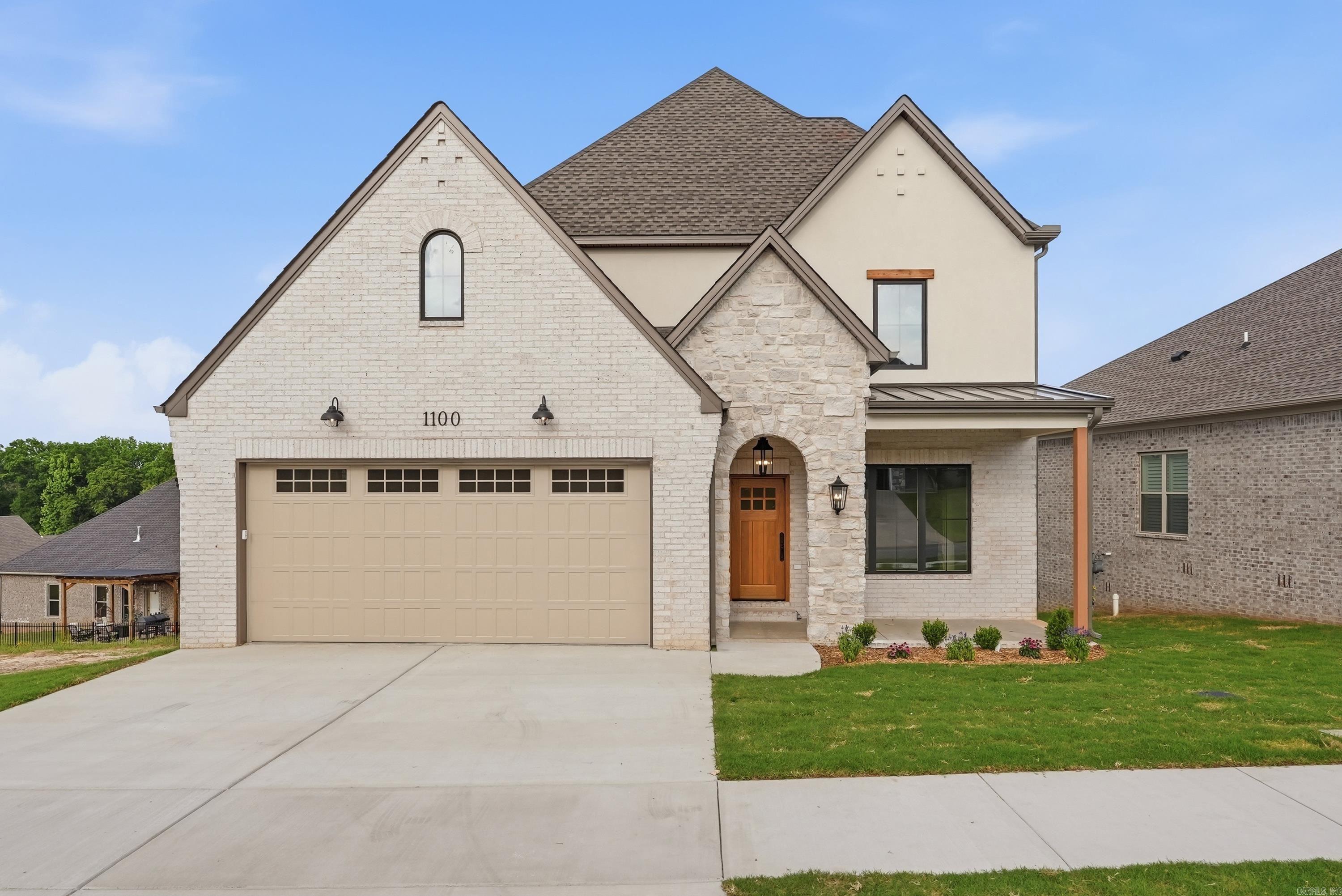 New construction by Sage & Stone Homes in a gated West Conway community, this 4-bedroom, 2.5-bath home features a well-designed layout. Highlights include 9’ ceilings, a spacious living room with exposed beams and gas fireplace, and an open kitchen with quartz countertops, stainless steel appliances, gas range, pot filler, walk-in pantry, and white oak cabinetry, along with a dining area featuring built-in bench seating. Additional features include a coffee bar area, LVP and tile flooring throughout, and a private primary suite with tiled walk-in shower, soaker tub, and generous closet space that connects to the laundry room. Dedicated laundry room with mudroom area, tankless gas water heater, covered back deck, and covered storage below. Built with an encapsulated crawlspace and engineered subfloor system for added efficiency and structural integrity. Agents see remarks.