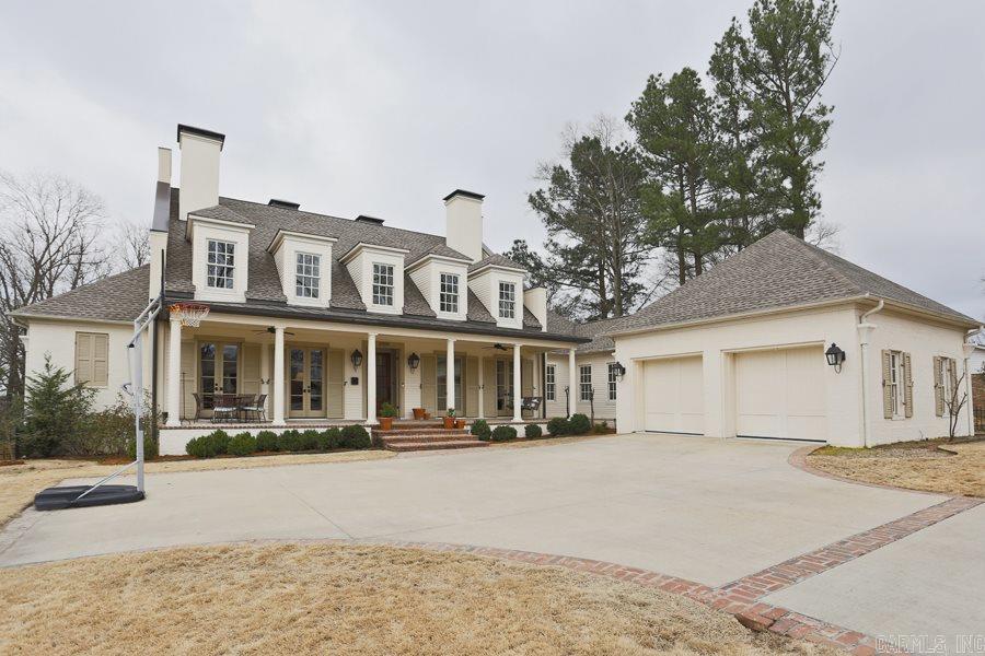 - Impeccable custom built Heights home on TWO lots with 8ft solid wood doors and tons of space for entertaining. The natural light and vaulted and 10 foot ceilings give an open feel. High end appliances in kitchen, bar and gorgeous back porch/outdoor grilling area with wood burning fireplace. Master on the main level with limestone in master bath and his and her closets. Smart home wired and large media room. This unbelievable home will not last!