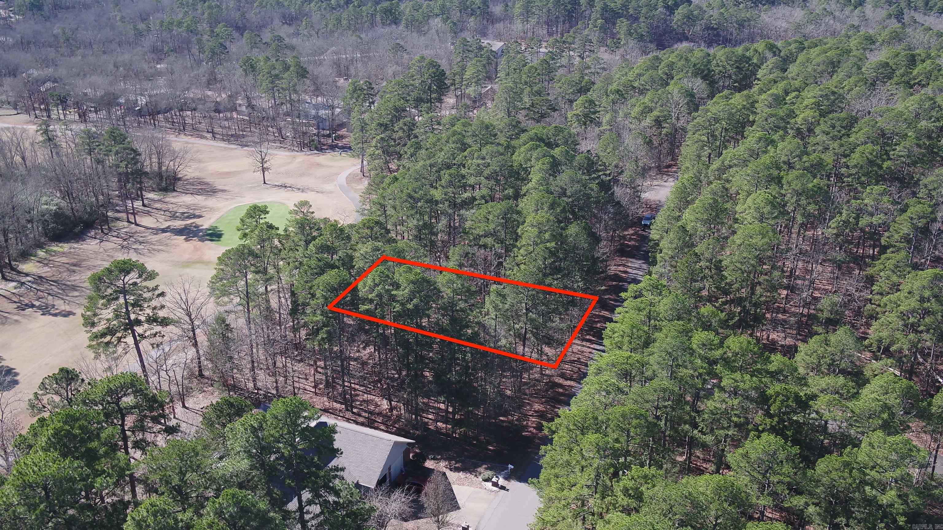 Build your Forever Home in the largest gated community in the United States with this select Saline County parcel.  Perfectly positioned for a custom build, this prime Saline County lot is nestled in the hills of Hot Springs Village. Overlooking the lush fairways of Coronado Golf Course, ownership of this parcel grants you access to a world-class lifestyle, featuring 11 stocked lakes, 9 championship golf courses, and a variety of amenities. Hot Springs Village maintains a fitness center, an indoor heated pool, racquetball courts, and more.  This particular parcel is about a 40-minute drive to downtown Hot Springs, and a 1-hour drive to Little Rock.  Whether you desire a secluded golfer’s paradise or a peaceful base from which to explore the nearby cities, this Hot Springs Village site offers exceptional living at an unbeatable price. There is a one-time buy-in fee of $300.00 for new members to HSV, collected at closing, for an unimproved lot.