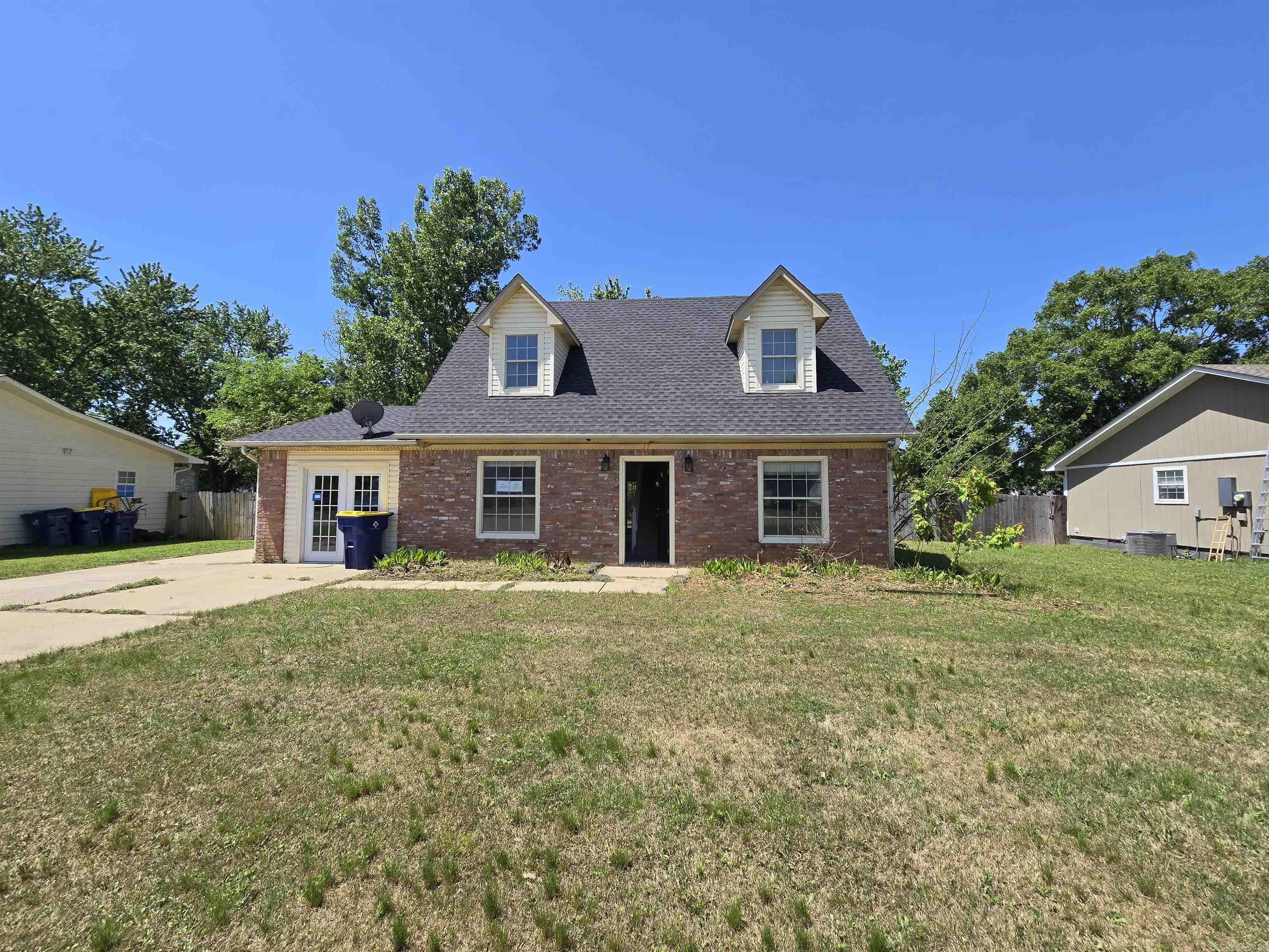 Come check out this charming home close to town, ball fields and local parks! This home consists of 3 bedrooms and 2 baths with the main suite located down stairs, and 2 bedrooms and a bathroom upstairs. There is an additional bonus room off of the living area. Granite counters throughout. A large 2 car shop sits in the back with a fenced in yard. AGENTS SEE REMARKS