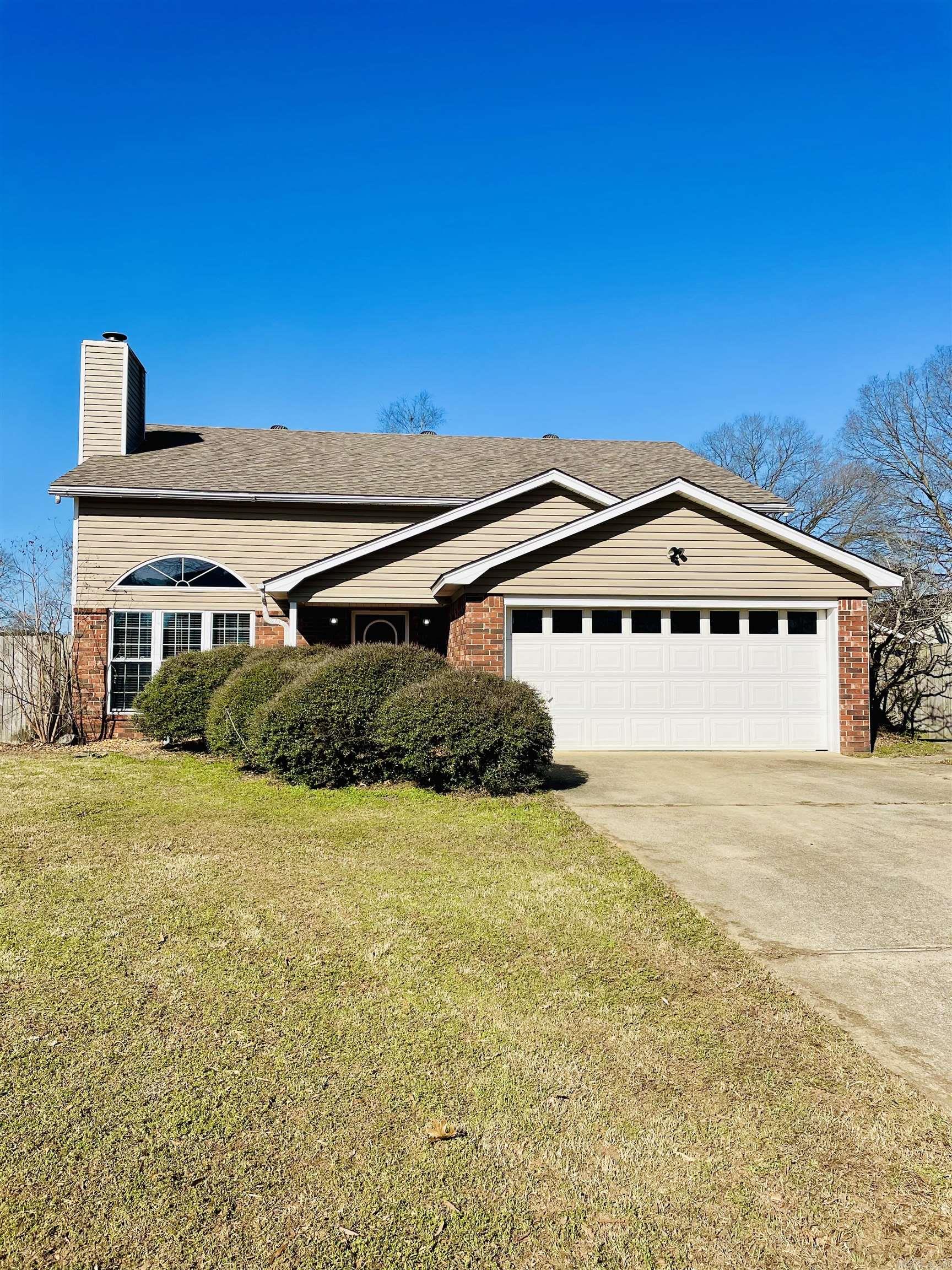 Welcome Home!!  This beautiful home is close to EVERYTHING and is situated on fully fenced half acre with a shop! Step inside to a welcoming Great Room, 2 BONUS rooms, 3 bedrooms, 2.5 baths, and spacious kitchen. Bryant schools are within a mile.  This one will not last long!