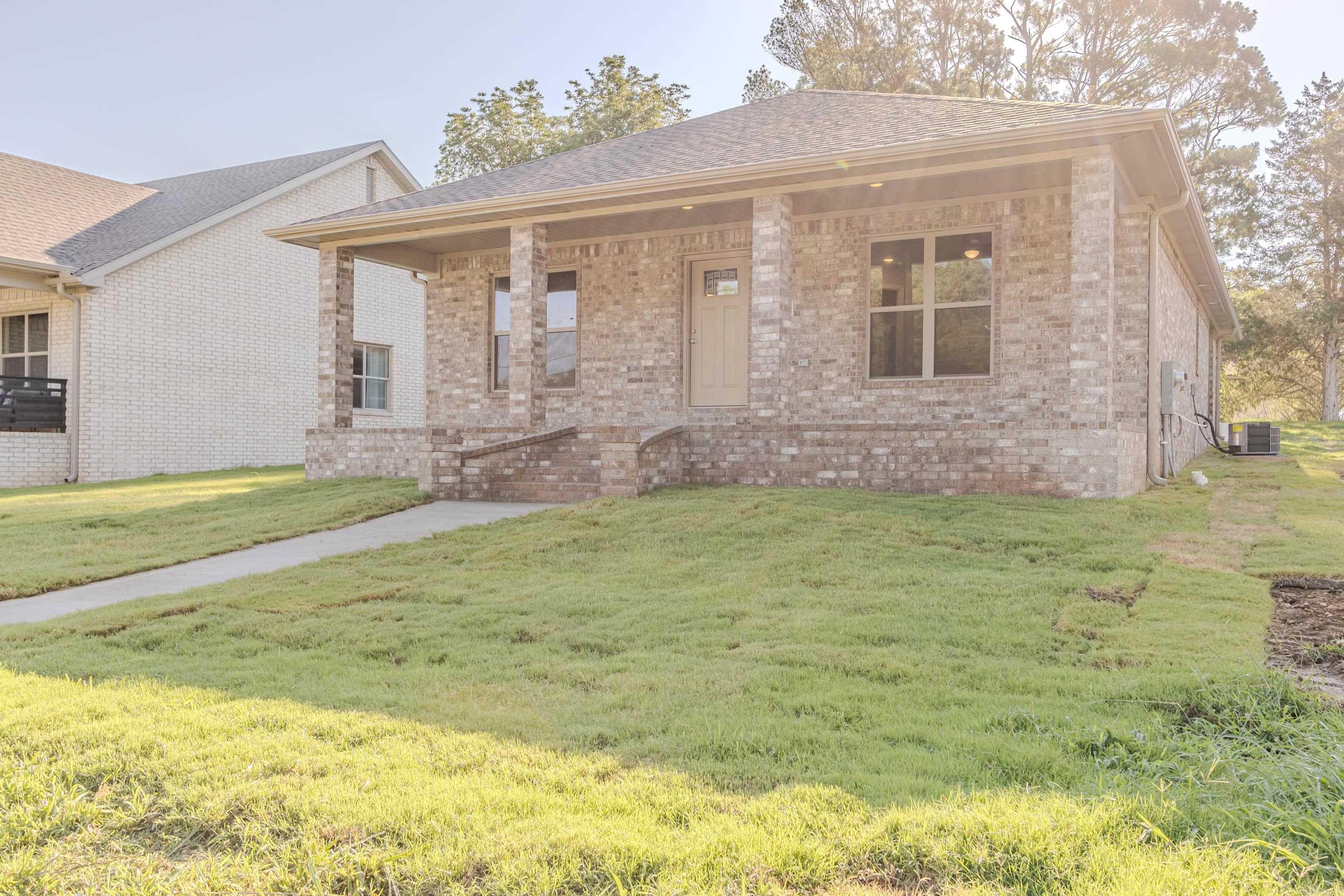 This is one you don't want to miss!!  Well designed, functional layout located in the Northend Overlay District of Paragould.  The home offers custom cabinets,  quartz countertops, stainless appliances, luxury vinyl plank flooring, and a custom tile shower. The builder has made this one very unique.. All bedrooms have their own private bathrooms. There is also a 2 car detached garage/shop with electricity and covered front/back porch. Call now and schedule your appointment to see this one of a kind New Construction.