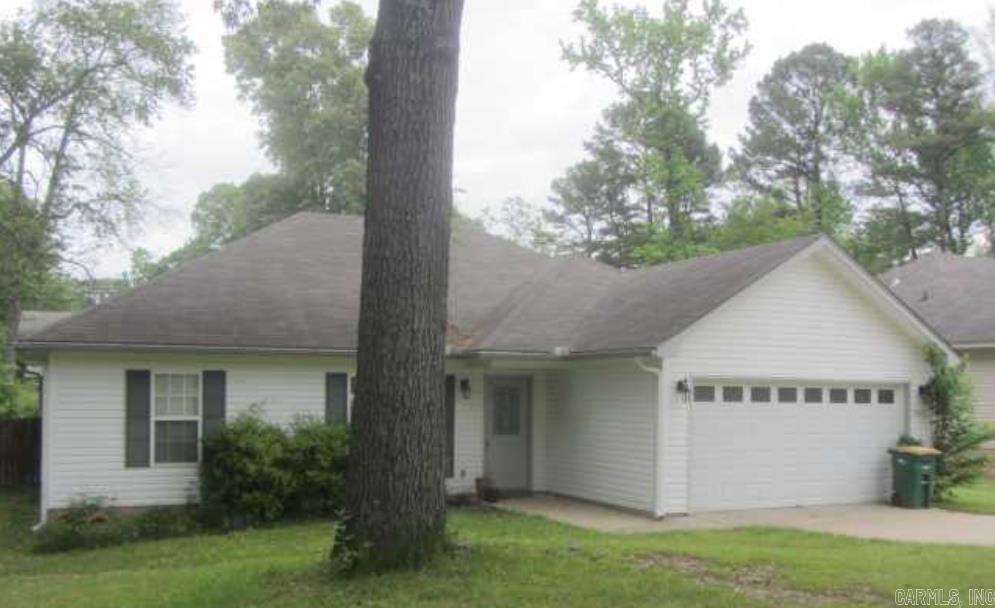 Welcome to this charming 3-bedroom, 2-bath split bedroom plan in Sherwood—perfect for first-time buyers or anyone seeking a move-in-ready home. Fresh paint, new flooring, and updated appliances create a bright, inviting feel throughout.  The open living and dining areas provide great flow for everyday living and entertaining. Outside, a brand-new deck overlooks a spacious backyard with plenty of room to relax, play, or host gatherings.  Conveniently located near parks, schools, shopping, dining, and major highways, this home offers comfort, style, and convenience the heart of Sherwood's Cherrywood Lake neighborhood. Schedule your showing today!