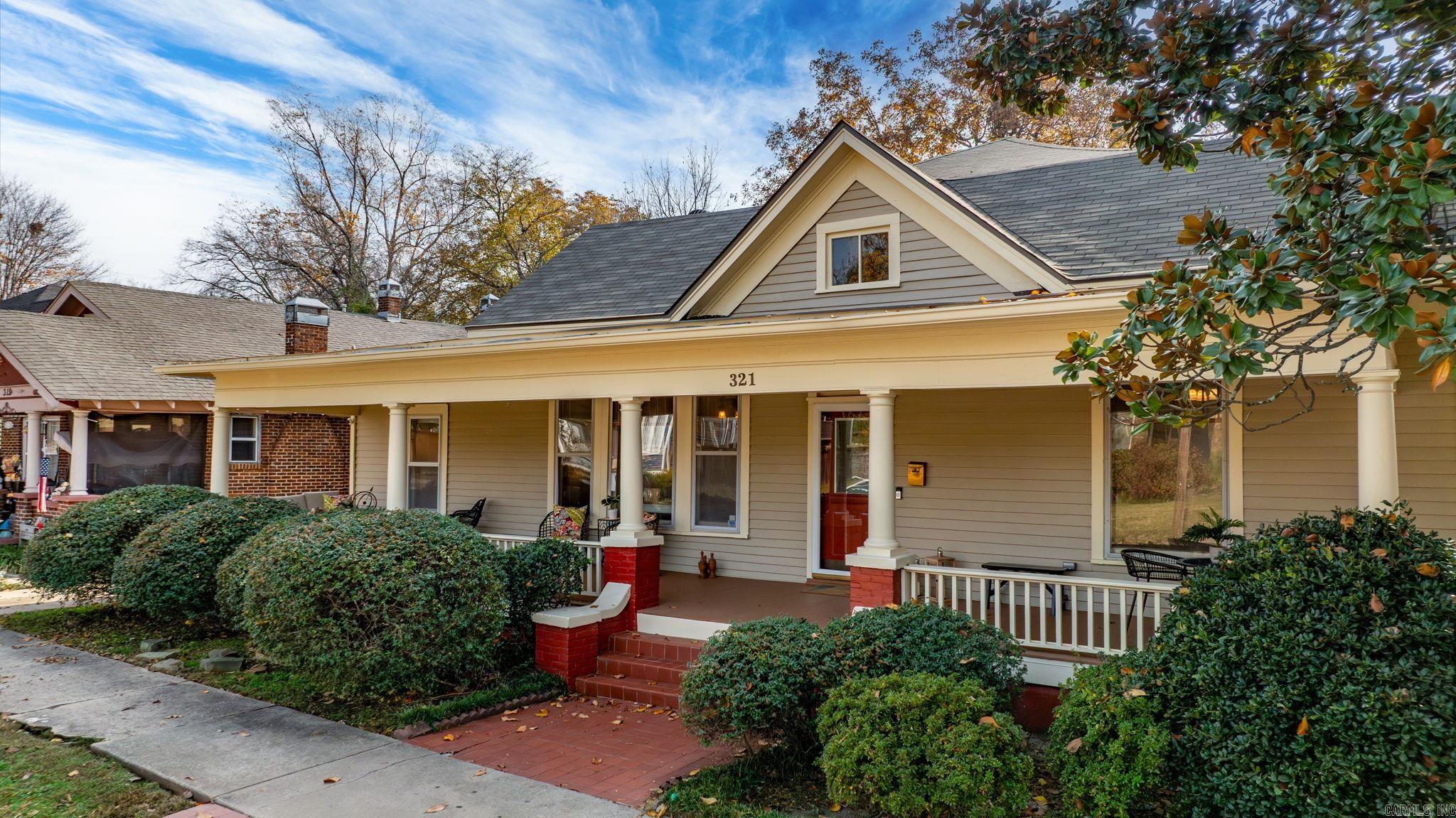 A storybook one-level home tucked away in the heart of the coveted Governor’s Mansion District. Built in 1900, this 3 bedroom, 2 bath delightful residence blends historic character with cozy, easy living. From the moment you arrive, you’ll notice the timeless curb appeal and the quiet charm that only a century-old home can offer. Inside, original details shine — tall ceilings, warm, original hardwood floors, and classic craftsmanship throughout. Sun-filled rooms create an inviting atmosphere, and the single-level layout makes the home feel both comfortable and accessible. Each space has its own personality, yet the home flows effortlessly from one room to the next.  Outside, a sweet front porch and a private backyard offer the perfect spots for morning coffee, evening unwinding, or entertaining friends. Full of charm, history, and heart, 321 W 22nd is a rare find in one of the city’s most beloved neighborhoods — a true gem ready for its next chapter! Let its character welcome you home! New roof 2025.   New Exterior & Interior Paint & trim repair 2025.  HVAC & Ductwork Replacement 2019.