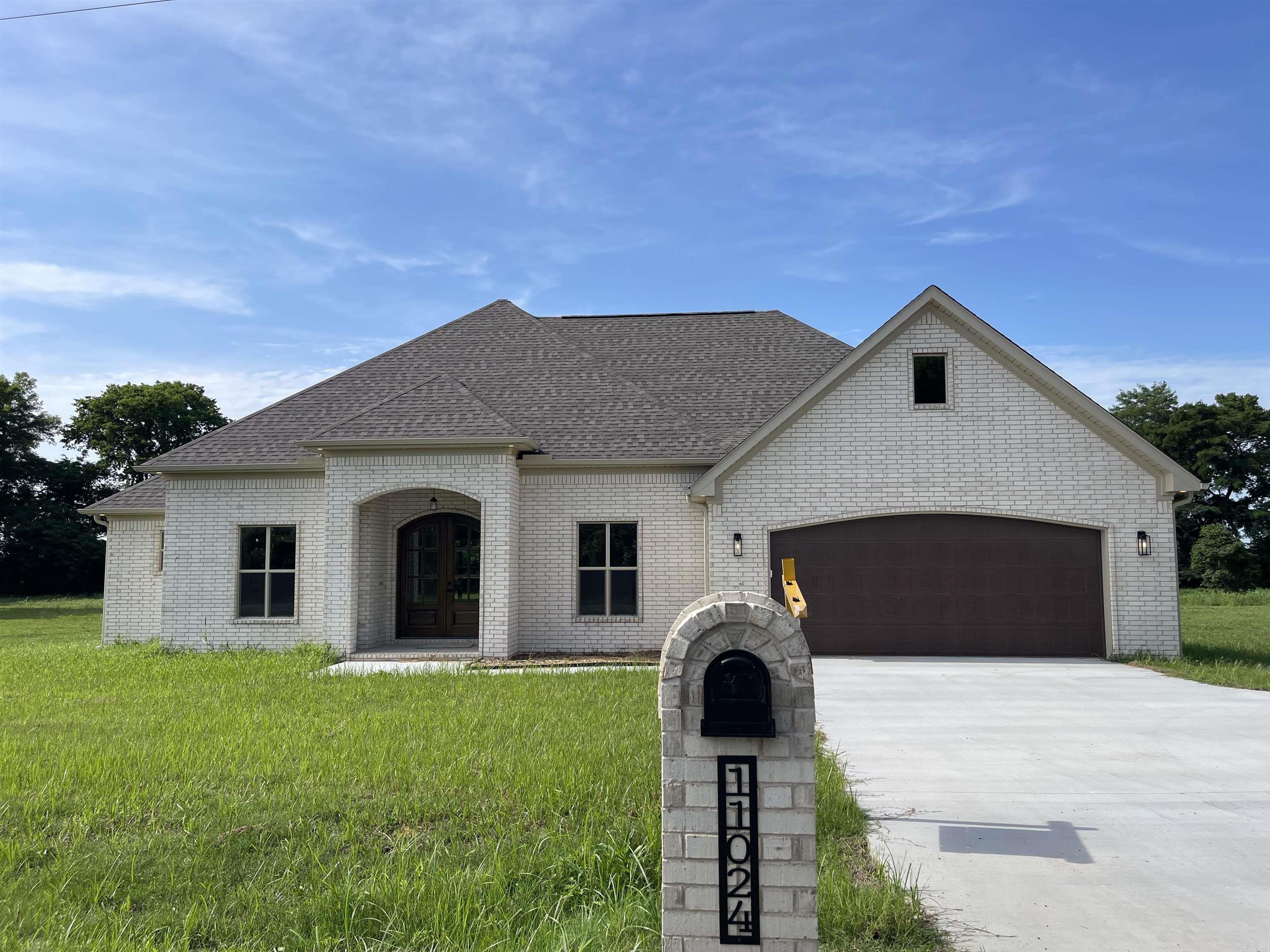 New construction, open floor plan on the estate-size lot, 3 bedroom, 2 full baths, and a separate dining room. High ceiling throughout master and living room. Quartz countertops throughout, luxury vinyl flooring, tiles, carpeted bedrooms. Walk in closet, walk in panty. 2 car garage with extra parking pad. Cover porch with a patio. Rapidly growing in Scott area, near the airport and industry. Quartz countertops throughout the house.