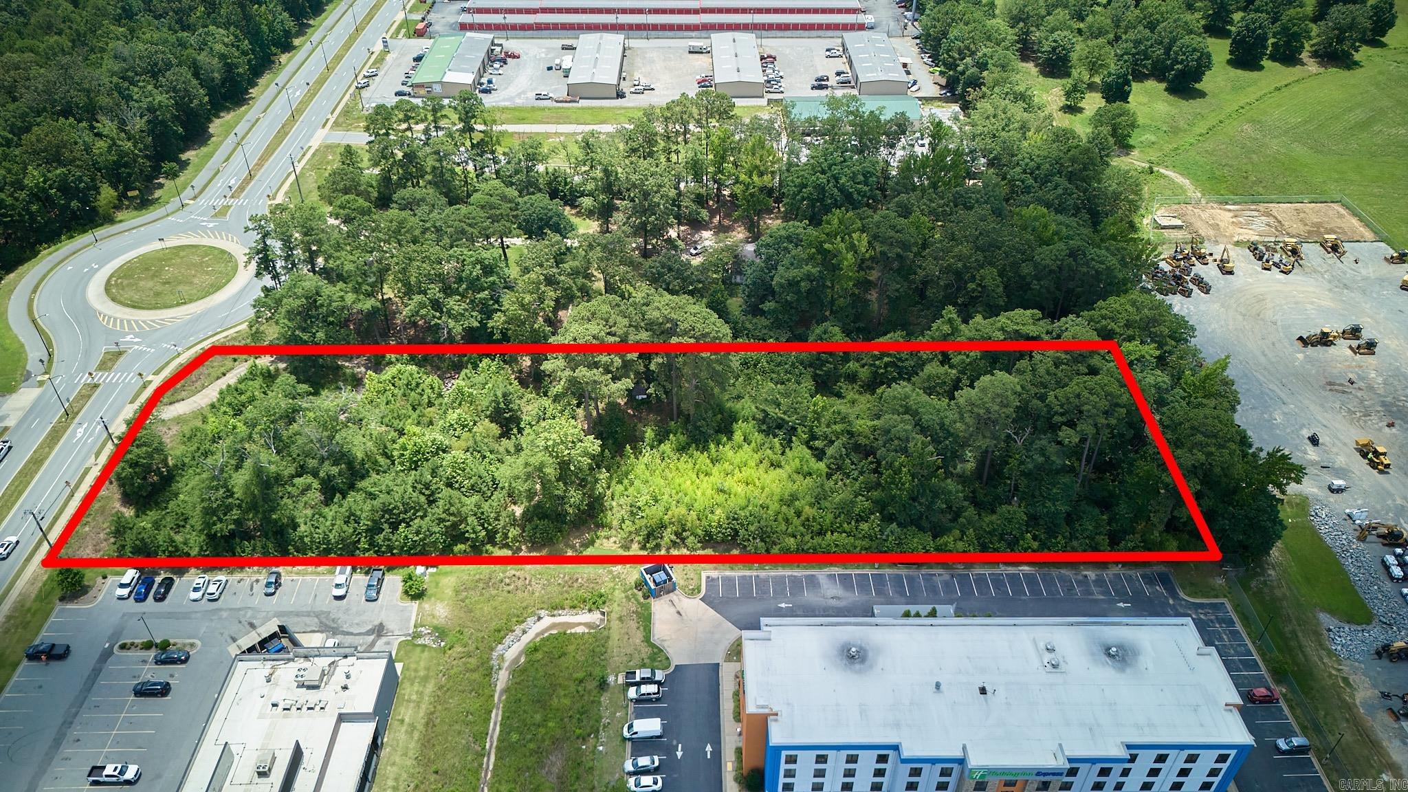 Exceptional commercial opportunity in one of the fastest-growing corridors in Saline County! This 3.10± acre tract at 7120 Alcoa Road, Benton, AR is zoned C-2 General Commercial, offering outstanding flexibility for a wide variety of commercial uses. Ideally positioned on highly traveled Alcoa Road with convenient access to Interstate 30, the property is surrounded by established retail, restaurants, hotels, medical facilities, and continued commercial development. The level site provides excellent visibility and accessibility, making it an ideal location for retail, office, medical, restaurant, automotive, service-related businesses, mixed-use development, or investment. With Benton and Bryant continuing to experience significant growth, this property offers an outstanding opportunity to establish or expand your business in a premier commercial location. Don't miss your chance to invest in one of Central Arkansas' most desirable business corridors! AGENTS SEE DOCS ONLINE