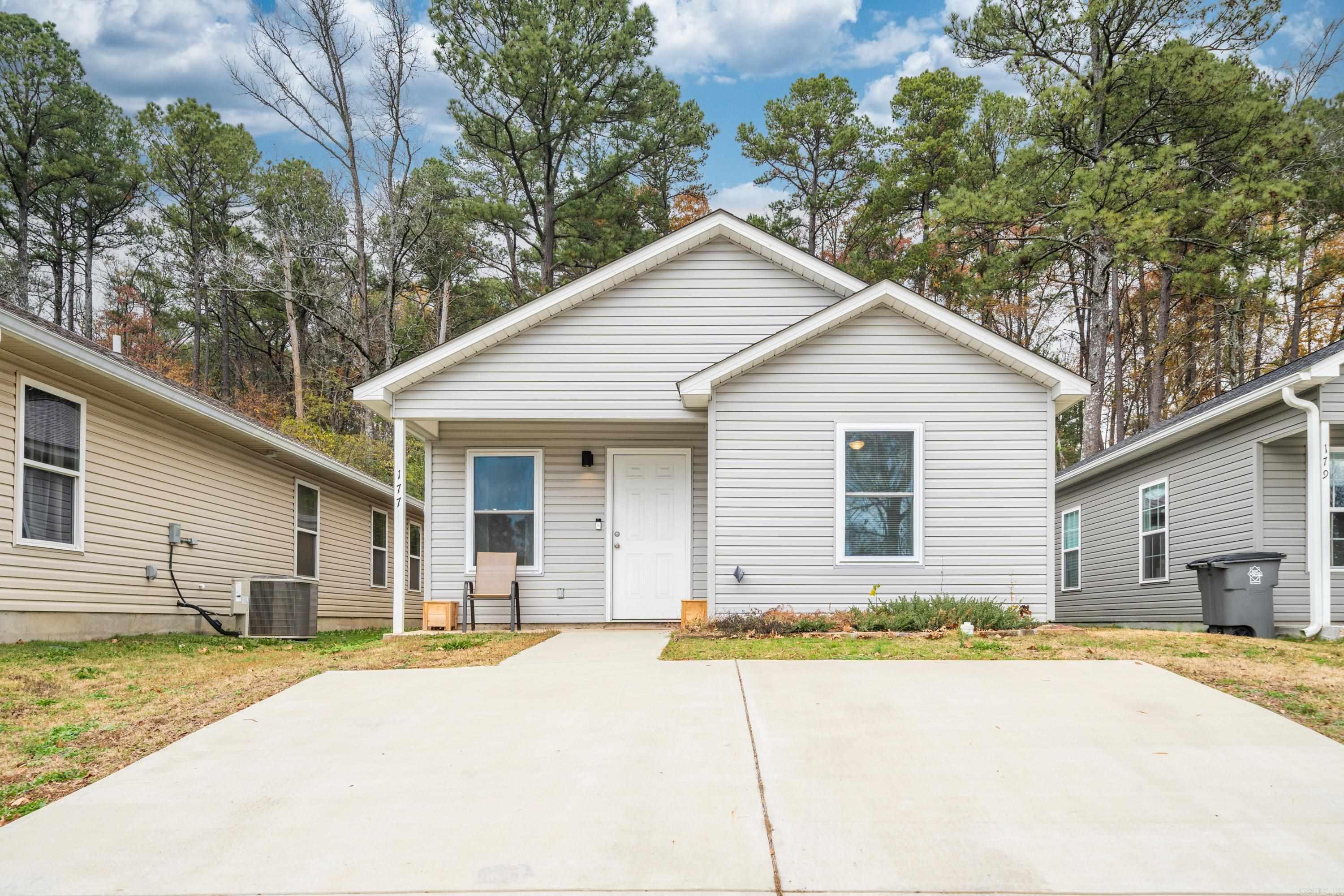 Very cute newer home built in 2021! Would be perfect investment or starter home! Conveniently located in the middle of town! Minutes to Oaklawn, shopping, hospitals and restaurants! All electric, granite countertops, LVP flooring, his/her closets, and primary bedroom fits king sized bed with lots of space left! Extra space in the attic for more storage!! Don't miss out on this one!