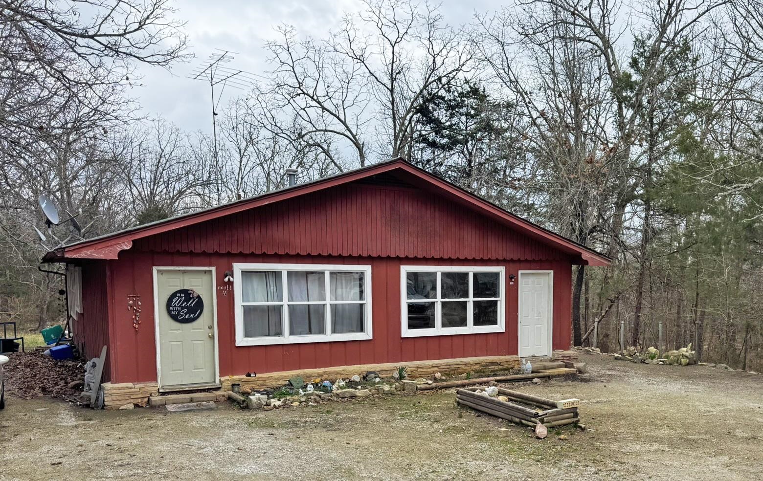 This well-maintained duplex is located in the Tract C Addition of Horseshoe Bend, Arkansas, offering an excellent investment opportunity.  Each unit includes 1 bedroom and 1 bathroom, offering comfortable and functional living spaces. One unit has been recently updated with fresh paint and a new heating and air unit within the past 2 years and is currently being rented. The second unit, also rented, shows minor wear but remains in good condition and appealing to prospective tenants.  With both units leased, the property has the potential to generate $1,400 in monthly income, making it a strong option for investors seeking reliable cash flow. This duplex is being offered at $100,000.