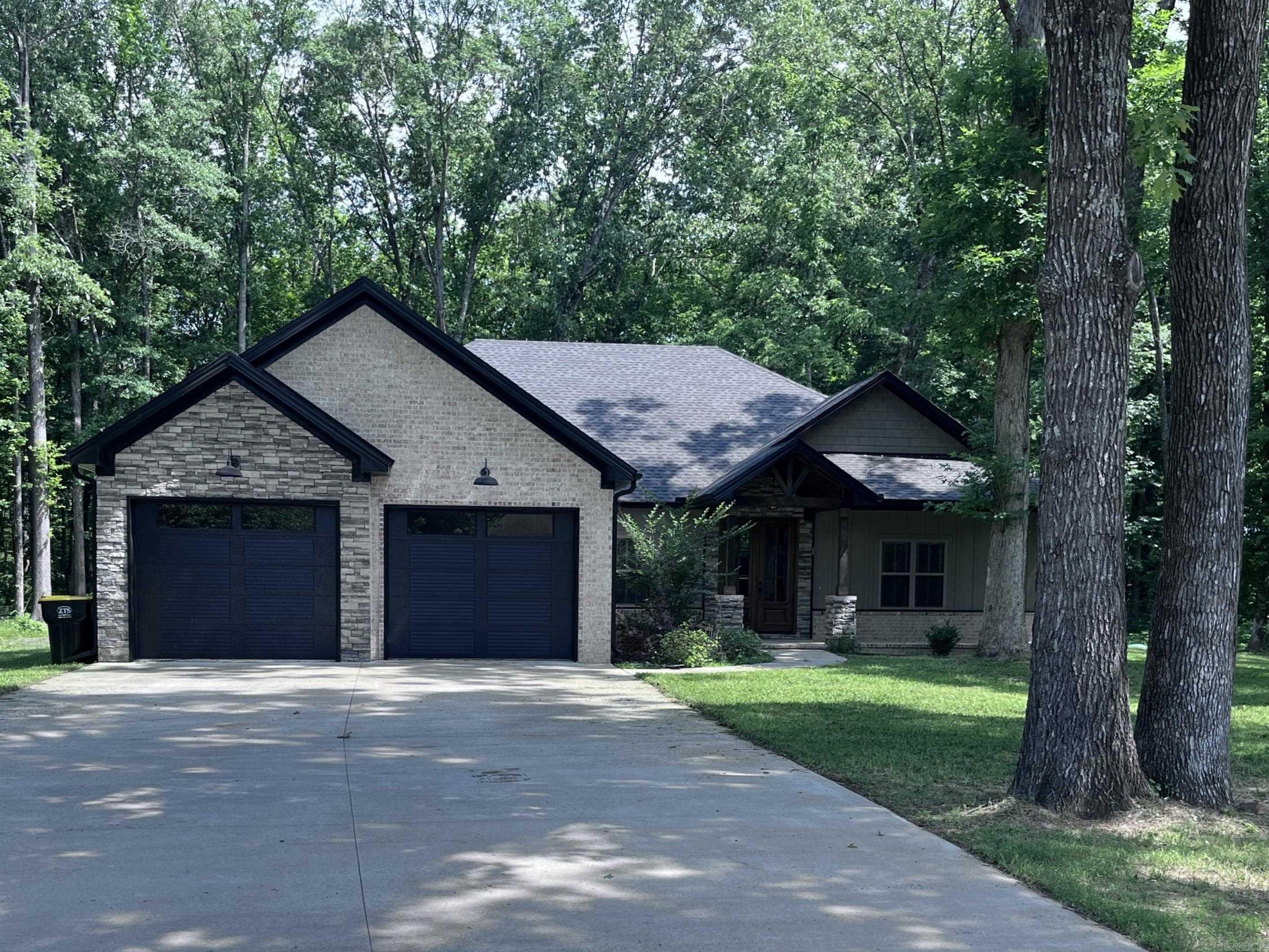 Gorgeous 4 bedroom, 2 bathroom home on 3 acres in the Cabot School District! Owner provides seasonal bi-weekly lawn care! Open floorplan with stone fireplace and accents, luxury vinyl plank flooring throughout, oversized kitchen - Refrigerator INCLUDED - deep pantry, and French doors leading to a covered patio. The spacious master bedroom also has an oversized bathroom and closet that leads through to the laundry room - making life a lot easier! Three additional bedrooms and bathroom on the opposite side of the house. This home is perfect anyone wanting space and serenity, but within minutes from the city! No lawn maintenance. No carpet. Open floorplan with high ceilings. Relaxing deck. Not your typical rental and won't last long!