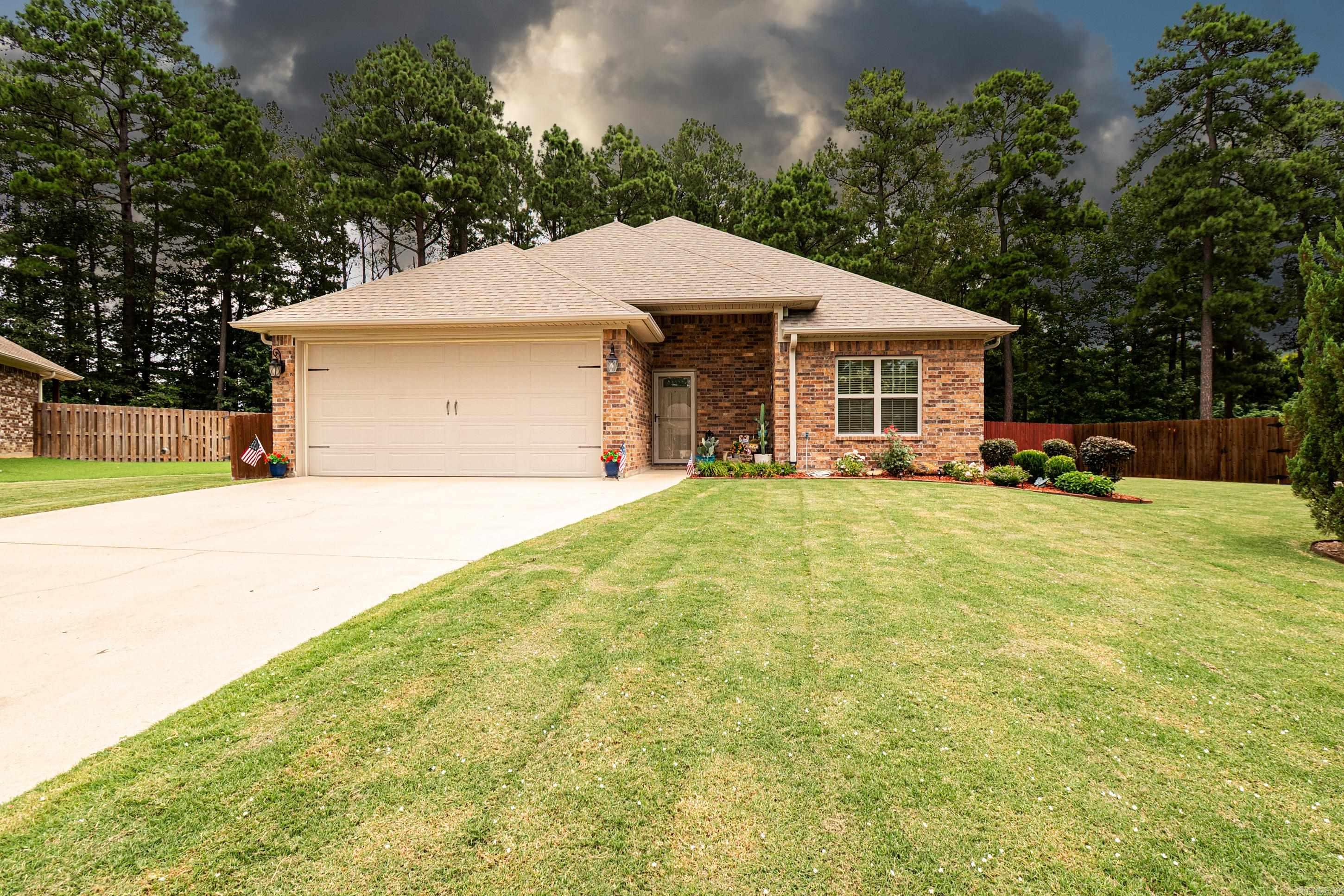 Welcome to this beautiful 3-bedroom, 2-bath home, built in 2016 and located in the highly sought-after Mystic Creek subdivision. This well-maintained home offers modern comfort, quality craftsmanship, and thoughtful upgrades throughout.  The spacious kitchen features upgraded appliances, making it perfect for both everyday living and entertaining. Fresh paint throughout the home gives it a clean, move-in-ready feel.  Step outside to enjoy the extended back patio, ideal for relaxing or hosting family and friends. The property also includes a custom-built 16' x 20' site-built shop, providing excellent space for hobbies, storage, or a workshop.  For added peace of mind, the home is equipped with a tornado shelter. With its desirable location, modern amenities, and exceptional features, this home is a rare opportunity in Mystic Creek.  Schedule your private showing today and see everything this exceptional property has to offer!  Bank prequalification letter or proof of funds is required prior to scheduling a showing or viewing of this home.