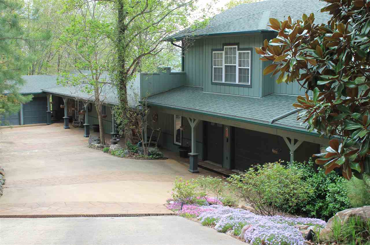 Gorgeous Vista/Lake Cortez views from all rooms of this meticulously cared for and updated 3BR 4BA home.The large MBR has a huge closet/sitting room, WP bath, walk-in shower, laundry room and is very private.You'll love the open floor plan, the updated kitchen & beautiful breakfast bar, the office/man cave, and over 1000 ft of reinforced deck. The extra 2 car gar can be used for a giant work shop. You'll love the courtyard atmosphere in front of the house, low maintenance yard, fenced area, and so much more