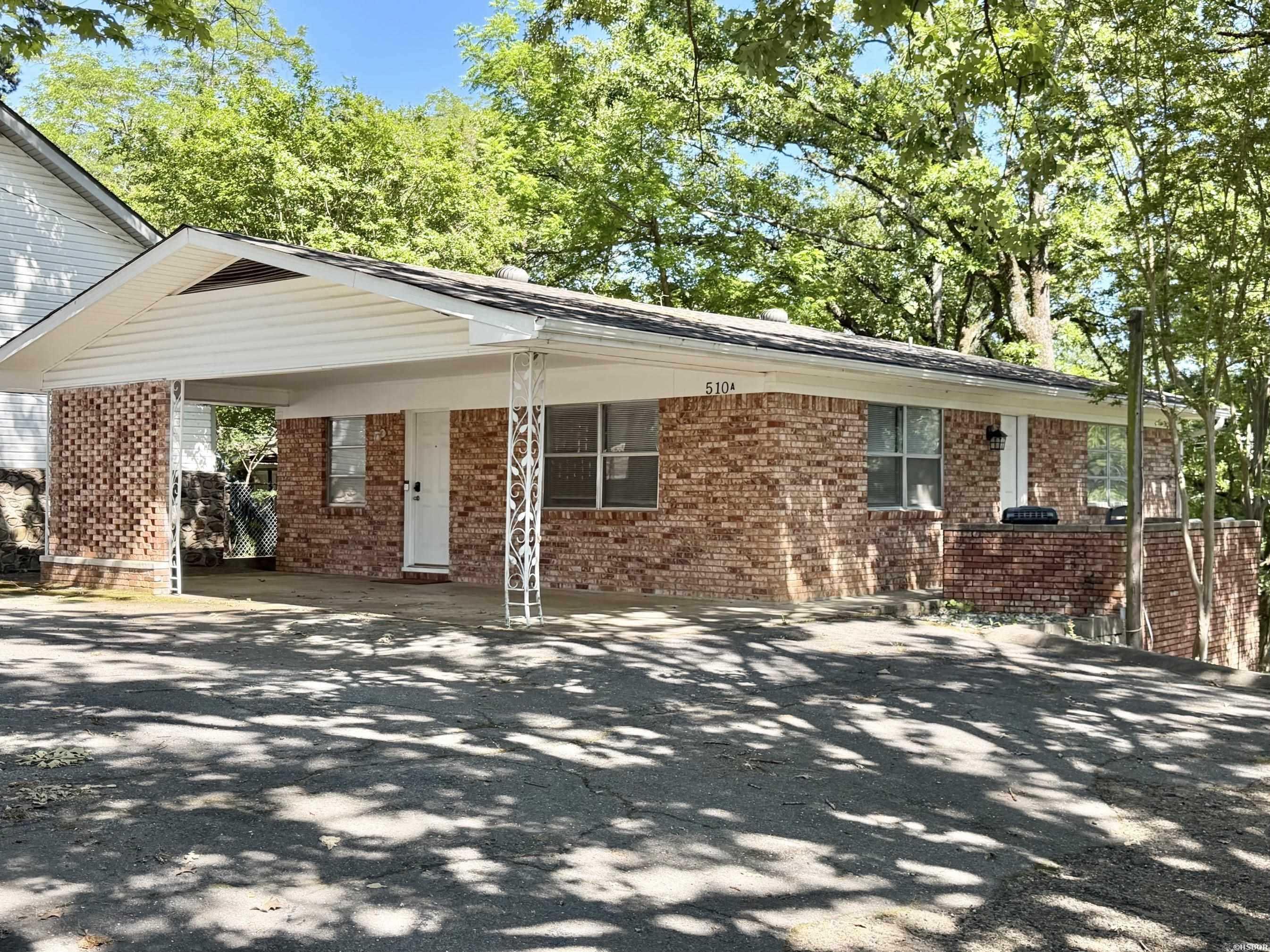 Fully renovated and fully furnished four-unit investment property located in a well known area across from Sam’s Pizza and within eyeshot of Lake Hamilton. Property includes a renovated 2BR/1BA unit, updated 1BR/1BA unit and two remodeled efficiency units, all featuring modern interiors and separate short-term rental licenses. One long-term tenant currently in place provides immediate income, while the remaining units offer flexibility for STR, mid-term or traditional rentals. Turnkey opportunity with strong income potential in a prime Hot Springs location.