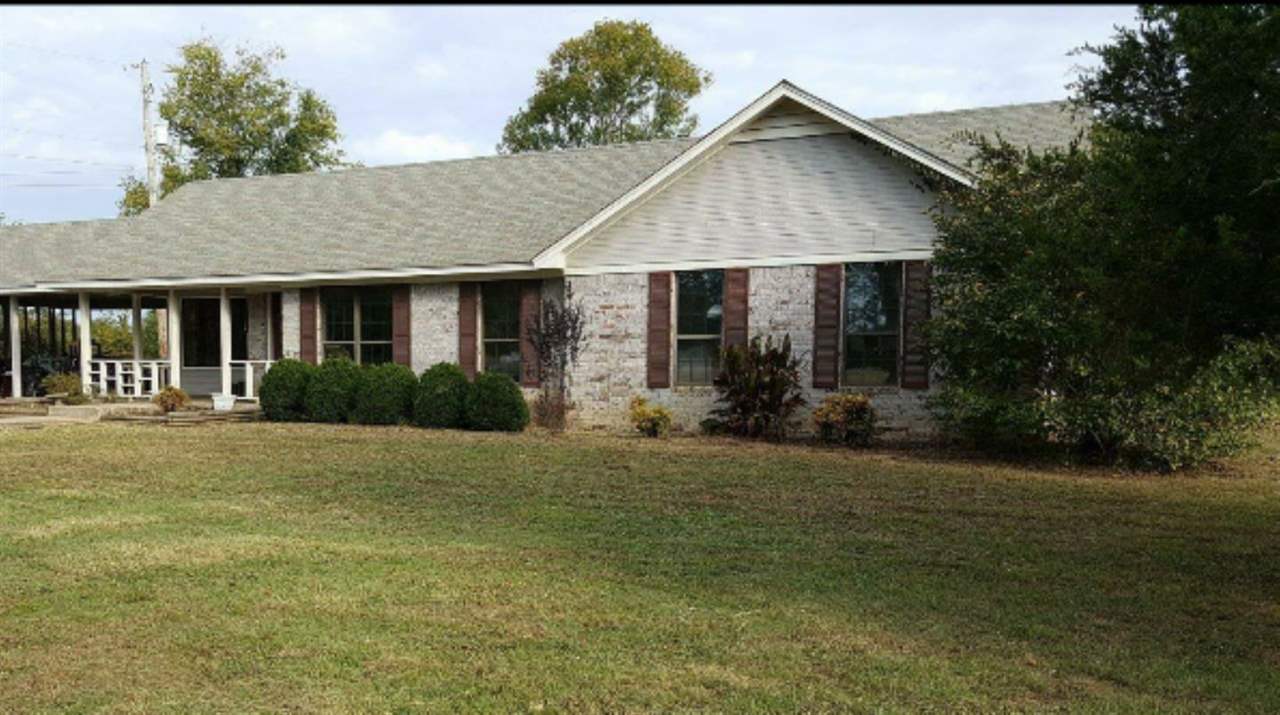 This wonderful 3 bed 2 bath house sits on 3.5 acres of cleared land with a pond.  Located on the outskirts of Greenbrier, this  home gives you the feel of country living with all the amenities of the city.  It features fresh paint, a bonus room with water hook ups and tile floors, as well as a separate building for extra storage or a workshop. Schedule your viewing today! Available to show beginning 12/5/16.