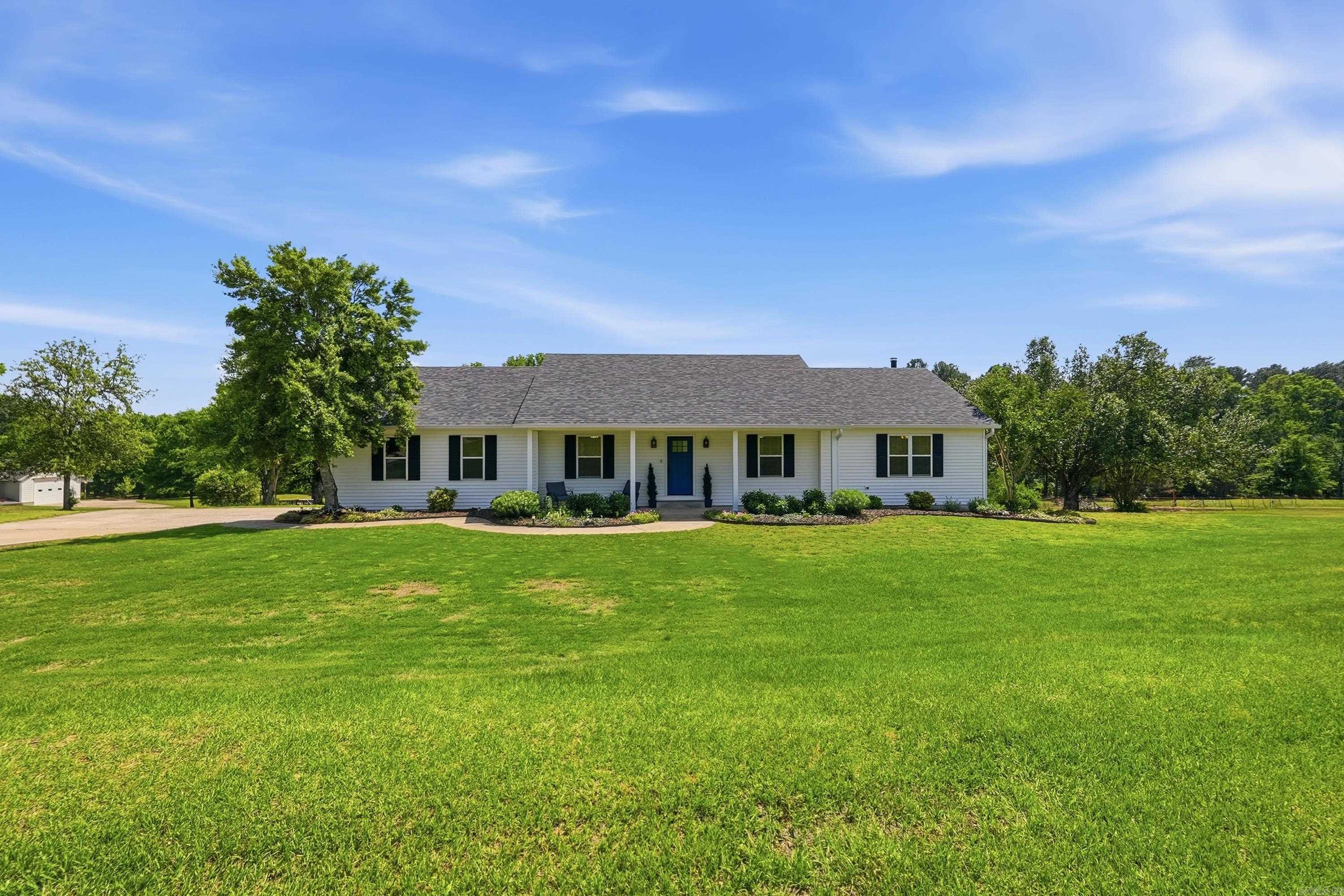 Stunning 3-Bed, 2.5-Bath Home on 3.18 Acres with FULL basement in Springhill!! This move-in ready home features a full unfinished basement with walk-out access, offering incredible storage or future expansion potential. Enjoy main-level living with a spacious primary bedroom with a luxurious walk-in shower, walk-in closet, kitchen/dining combo, beautiful wood and tile floors, granite counters, two more spacious bedrooms with walk-in closets, Jack and Jill bathroom, and an extra room for an office or bedroom. Recent updates: new HVAC system, new composite deck (2025), new roof (2023), primary bath and kitchen updated in 2016. Step outside to relax on the deck or covered porch, or take advantage of the two-car garage and peaceful, private setting on 3.18 acres! Located in the highly desirable Greenbrier School District, this is a fantastic value in a prime location! Ready for you to move right in and make it your own!