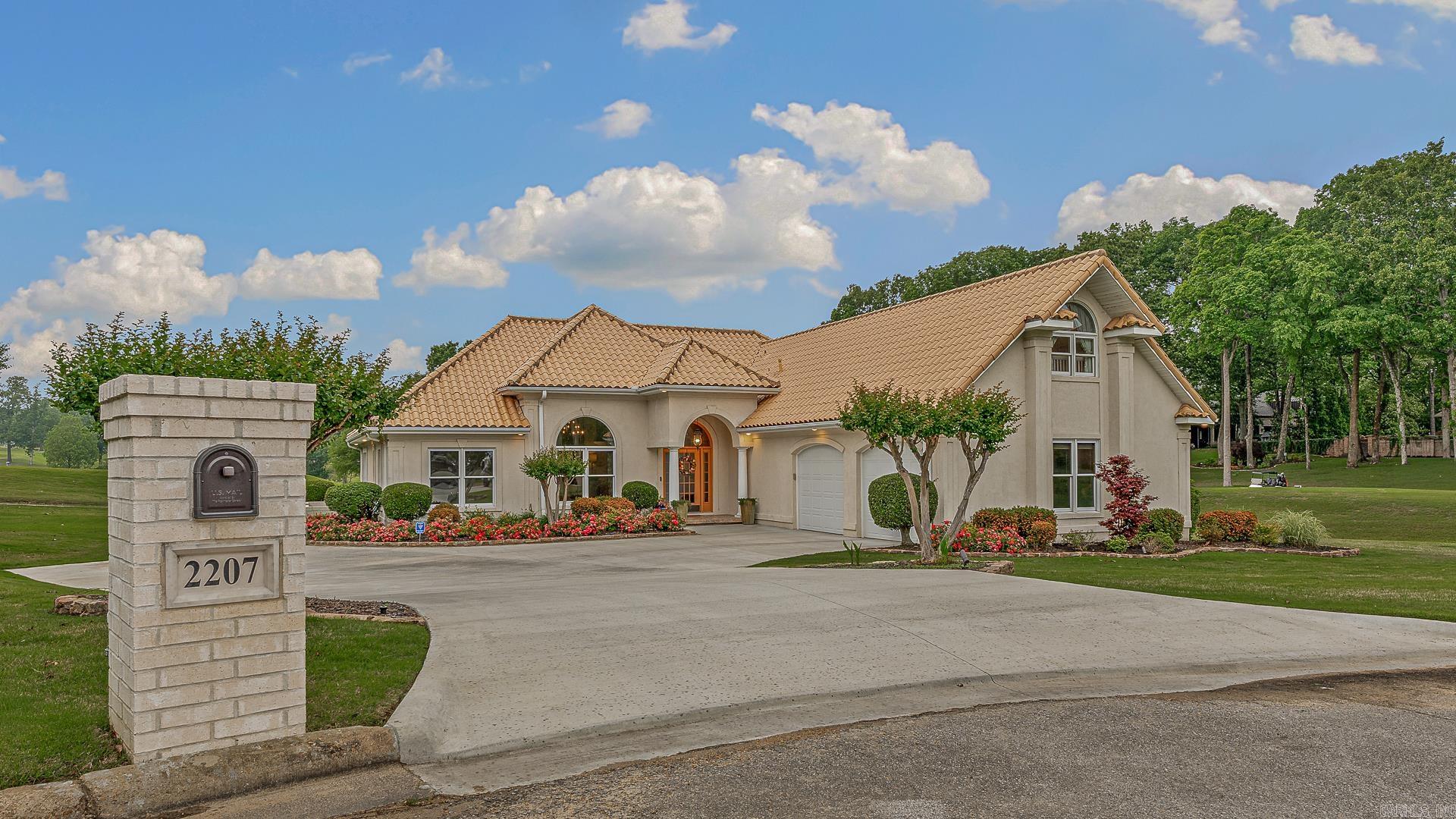 Welcome to 2207 Doral Cove, an exceptional golf course property perfectly positioned in the highly sought-after RidgePointe community. Nestled between the 17th green and 18th tee box, this home offers a rare opportunity to enjoy some of the most scenic and desirable views on the course.    From the moment you arrive, the home's distinctive Spanish-style exterior sets it apart, delivering character, charm, and standout curb appeal. Inside, you'll find a thoughtfully updated interior designed for both everyday living and entertaining.    The kitchen has been completely renovated with high-end finishes, featuring stunning Taj Mahal quartzite countertops, updated cabinetry, and a clean, modern feel that flows seamlessly into the main living areas. The primary suite has also been transformed, highlighted by a fully updated master bath with a spa-like atmosphere.    Step outside and experience what truly makes this home special. The outdoor living space is designed to take full advantage of its golf course setting, offering beautiful views, a relaxing atmosphere, and a well-appointed gazebo... perfect for entertaining guests or unwinding at the end of the day.    Whether you're a golf en