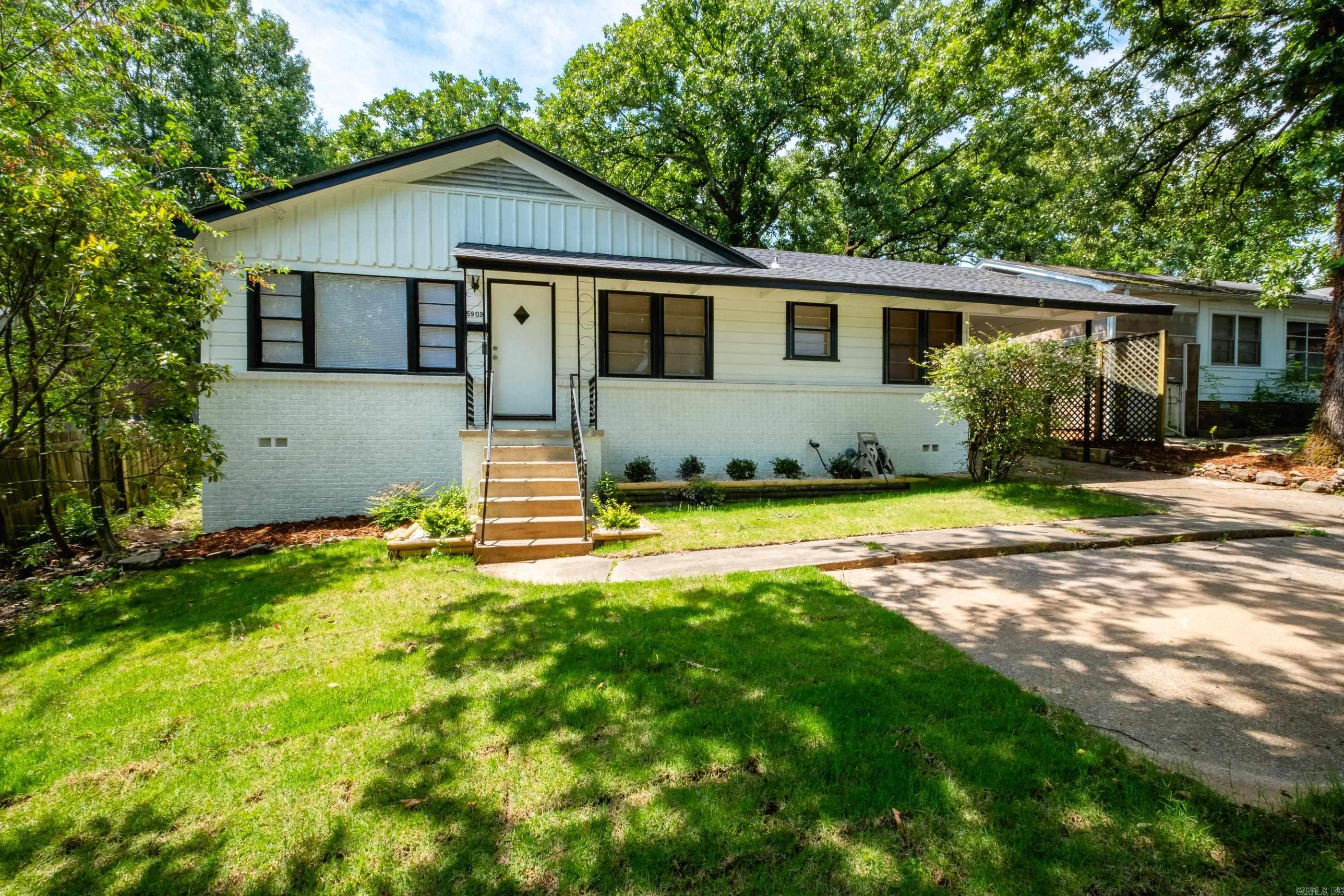 Absolutely stunning, fully remodeled Hillcrest gem in a prime midtown location.  This 3-bedroom, 2-bath home is packed with upgrades, including a new roof, HVAC system, and hot water heater. Refinished hardwood floors shine throughout, complemented by a beautifully updated kitchen and bathrooms featuring granite countertops, new appliances, and modern fixtures.  The private primary suite is a standout, complete with a sleek barn door and a fully updated en-suite bath.  Step outside to a spacious, wooded backyard with both a deck and patio—perfect for entertaining or unwinding in a peaceful setting.  Conveniently located just minutes from top dining, shopping, and all that Hillcrest has to offer.