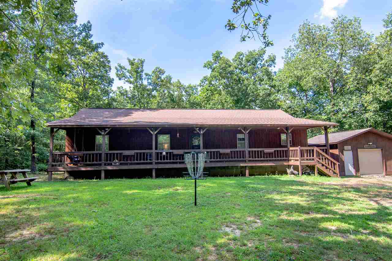 This home gives you privacy on 3.16 acres. Large front porch across the front of the home. Large eat in kitchen. 4 bedrooms. Split bedroom plan. Master has large walk-in closet. Nice storage building with concrete floor and shelving.