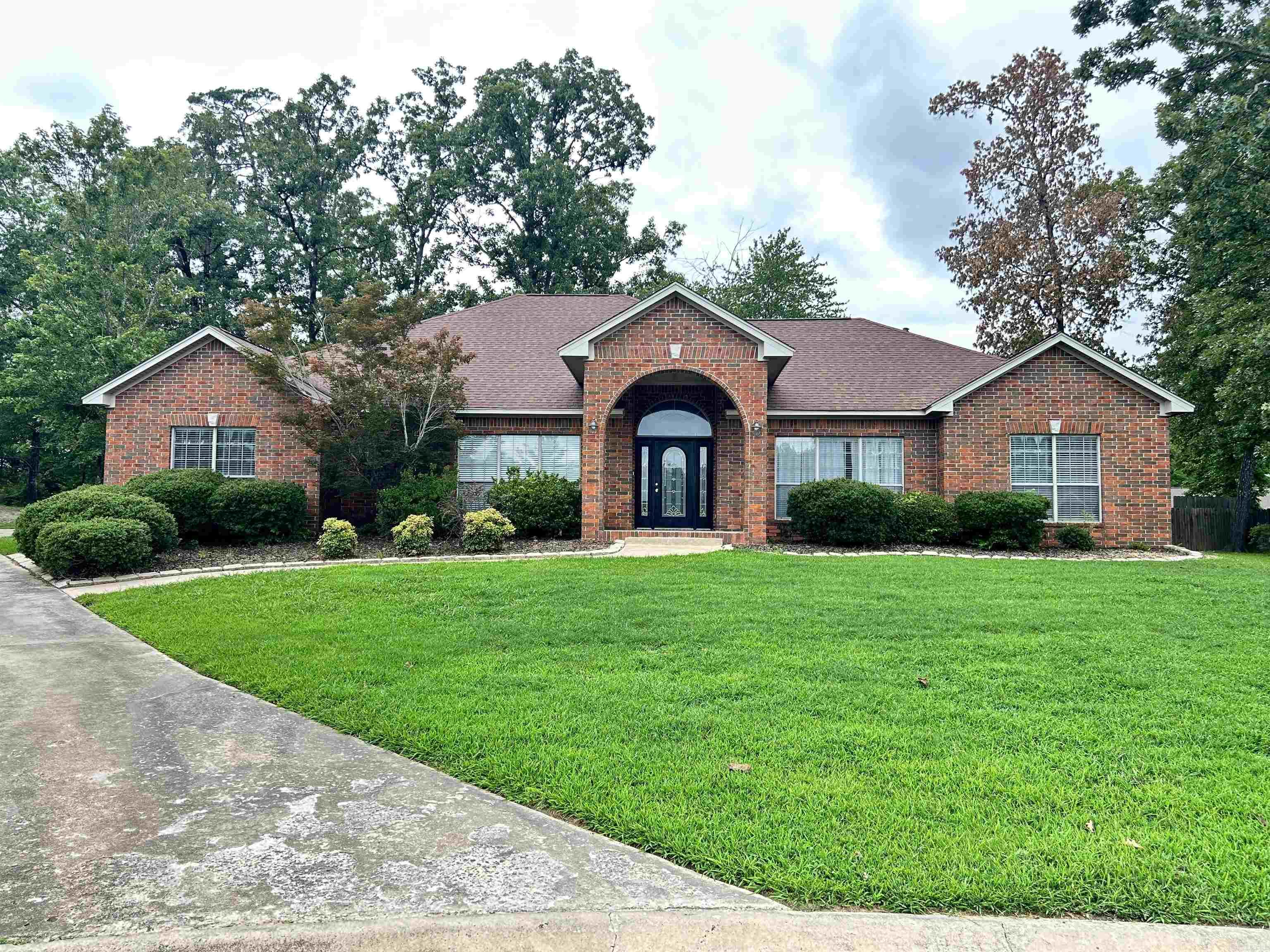 Located in the desirable Woodlands subdivision, this well-maintained 4-bedroom, 3-bath home offers approximately 2,992 square feet of living space with a functional floor plan designed for both everyday living and entertaining. The home features spacious living areas, a gas fireplace, a formal dining area, and a huge laundry room with ample storage and workspace. There is plenty of outdoor space for relaxation or gatherings, while the two-car garage offers additional convenience. Combining comfort, space, and thoughtful design, this property is ready to welcome its next owners.