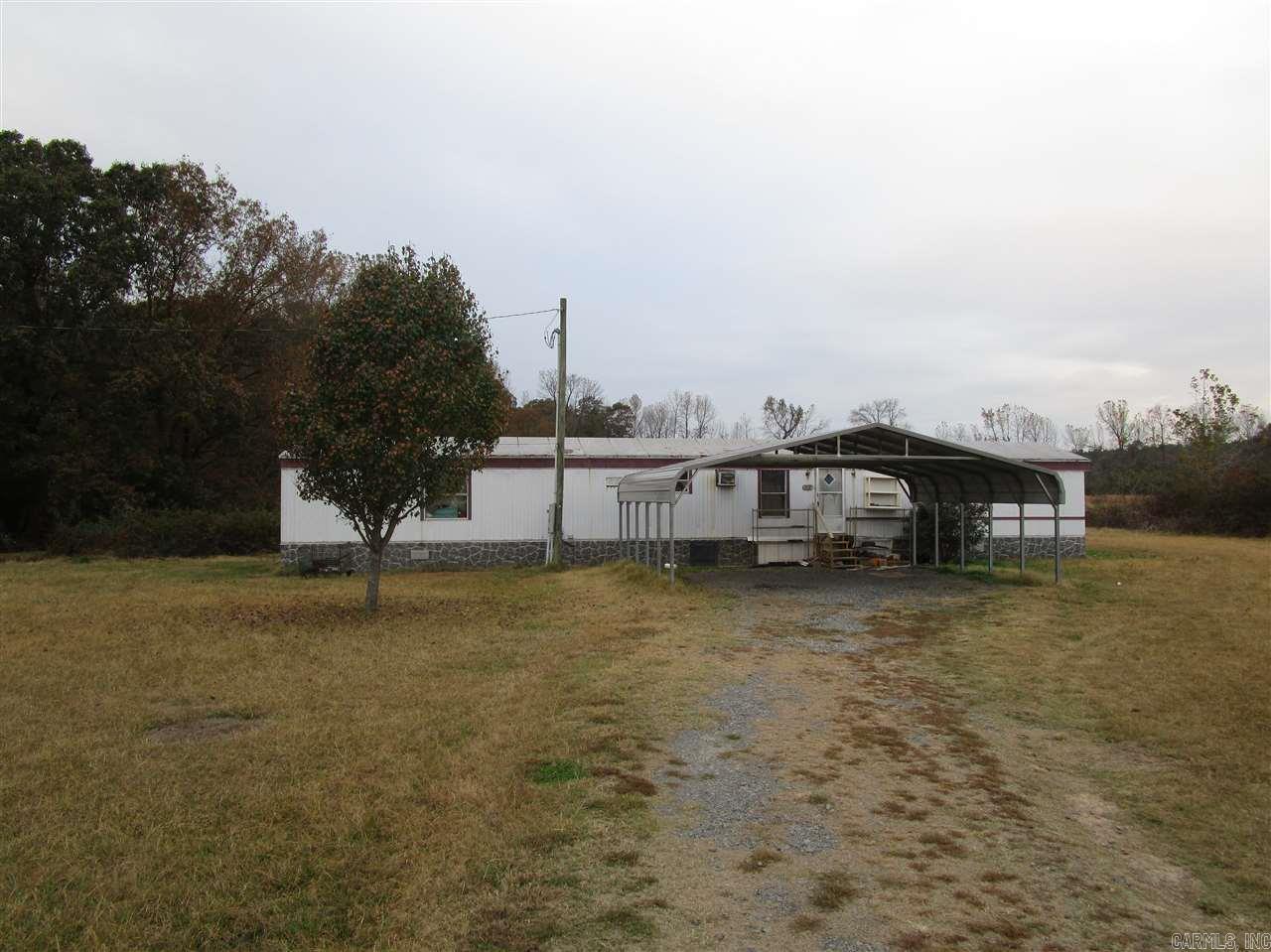 Three bedroom, two bath mobile home on 3 acres. Large level lot on a dead end street so very little traffic. Sq. Ft. approx. measuring encouraged. See Agent Remarks!