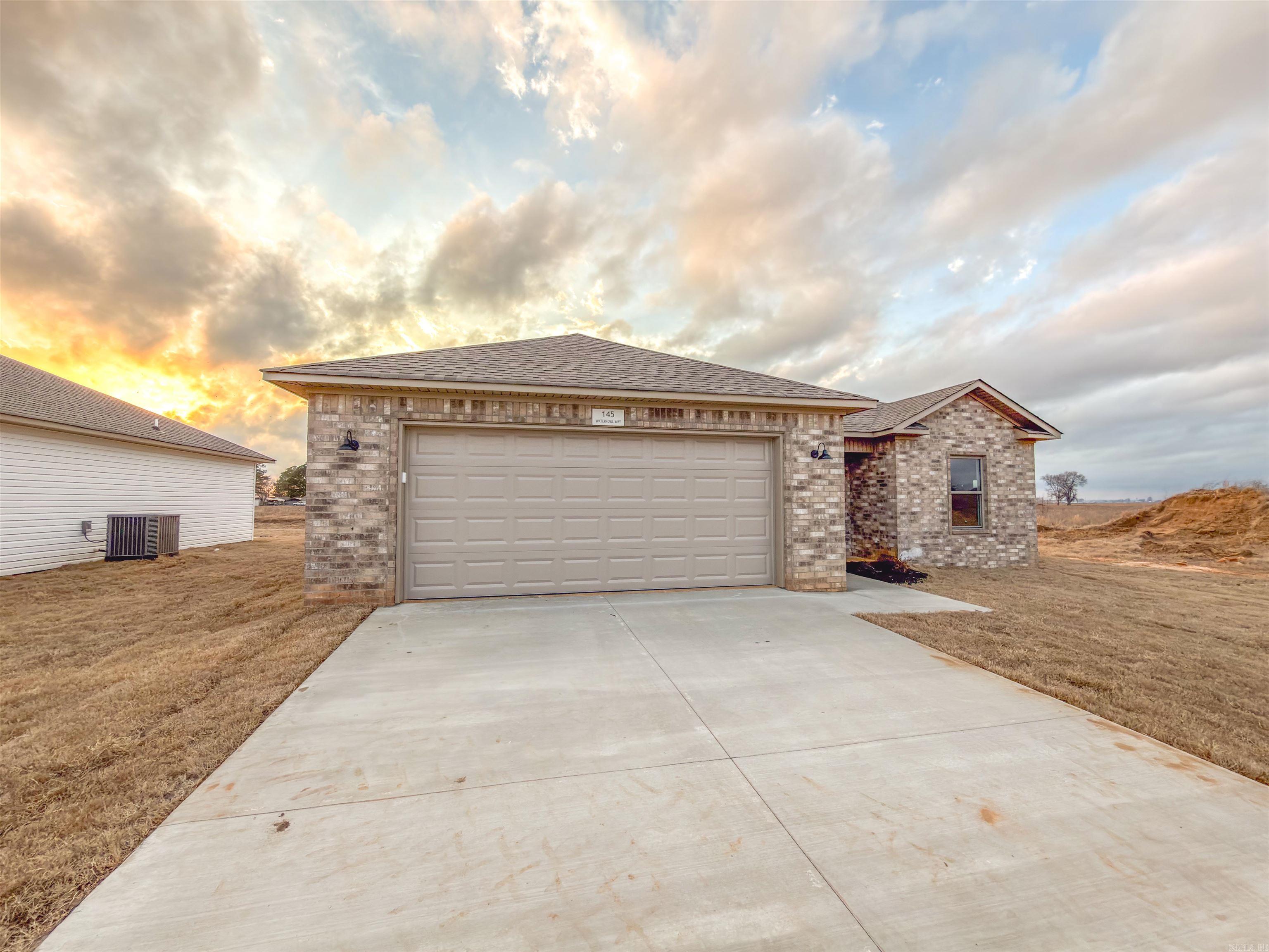 Modern, move-in ready, and located in the desirable Lakewood subdivision of Lake City! This 1,299 sq ft home features an open, light-filled layout with cozy caramel cabinetry, bold black hardware, and striking drama marble countertops that elevate the kitchen. Designed for both everyday living and entertaining, this home offers stylish finishes throughout and easy access to local shopping, dining, and amenities. A perfect blend of modern design and convenience schedule your showing today before it's gone!
