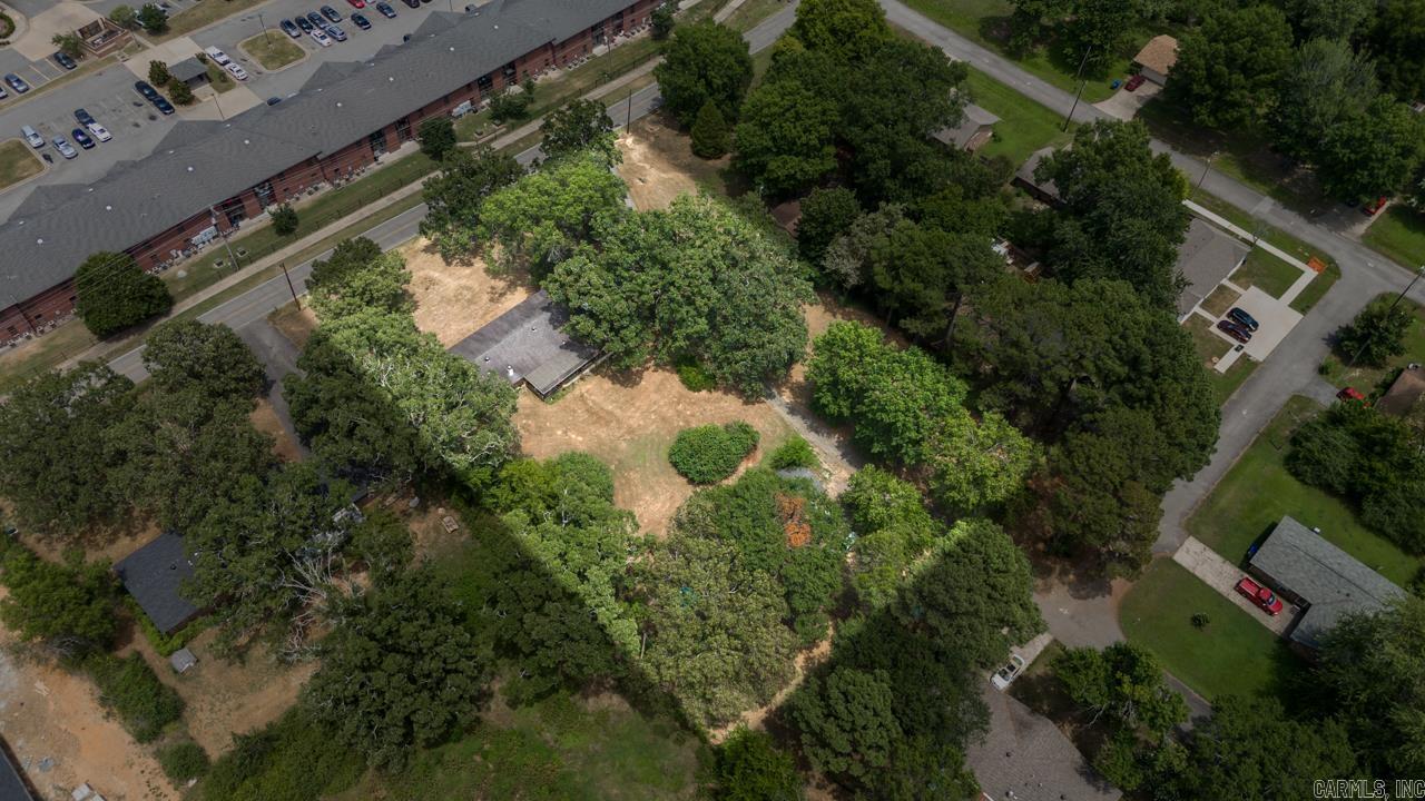 Two rentals and 1.55 acres! Enjoy the Income while you plan for your new build multi family rentals! This 1.55 acres would be perfect for new duplexes or apartment complex! if you want or need land for multi family this is your opportunity!! Call for information provided by the city for development! Professional drone to follow.