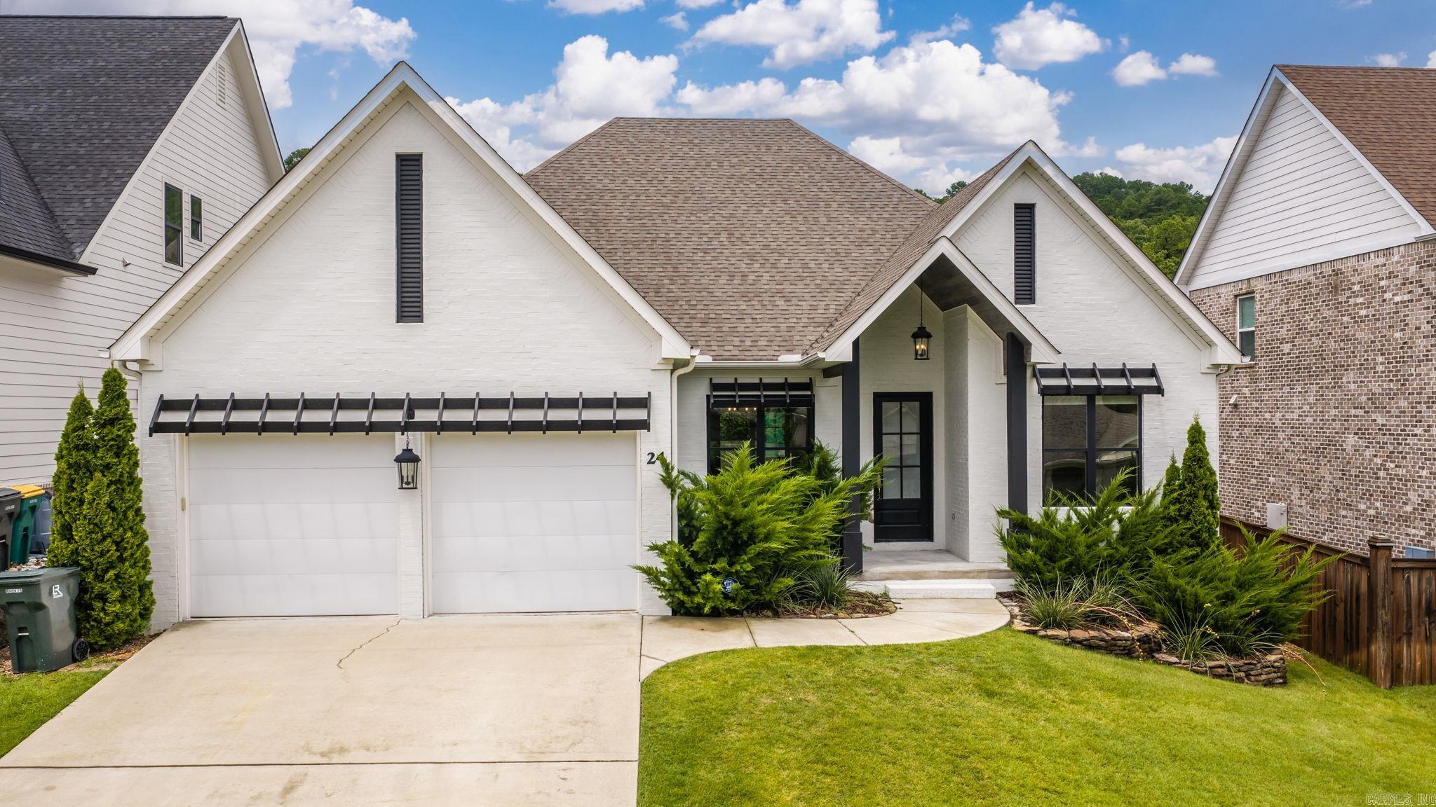 This stunning like new home in Village at Ison Creek blends comfort with convenience. Located off of Cantrell and Pinnacle Valley Rd and zoned for Don Roberts Elementary and Pinnacle View. Step inside this all-brick home to your open concept entry/dining/living. Each area bathed in natural light. Off to the right is your office/fourth bedroom. The kitchen is a chef's dream with pantry, gas range, loads of cabinetry, and a beautiful island with barstool seating. The laundry is off the garage and provides a sink, storage, and countertop space for all your needs. A primary suite is tucked away with oversized walk-in closet, primary bath, and beautiful views of your backyard. A covered rear patio provides a quiet retreat for outdoor life and leisure. On the other side are two additional bedrooms and a full bath! This home has been well maintained and is shining bright for you to dream, look, and make this one your own!