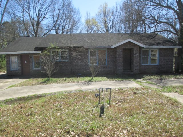 Looking for a new project?  This is it!!  This brick home  has 3 bedrooms and 1 bath.  Call today for your personal tour.  **Agents See Remarks**