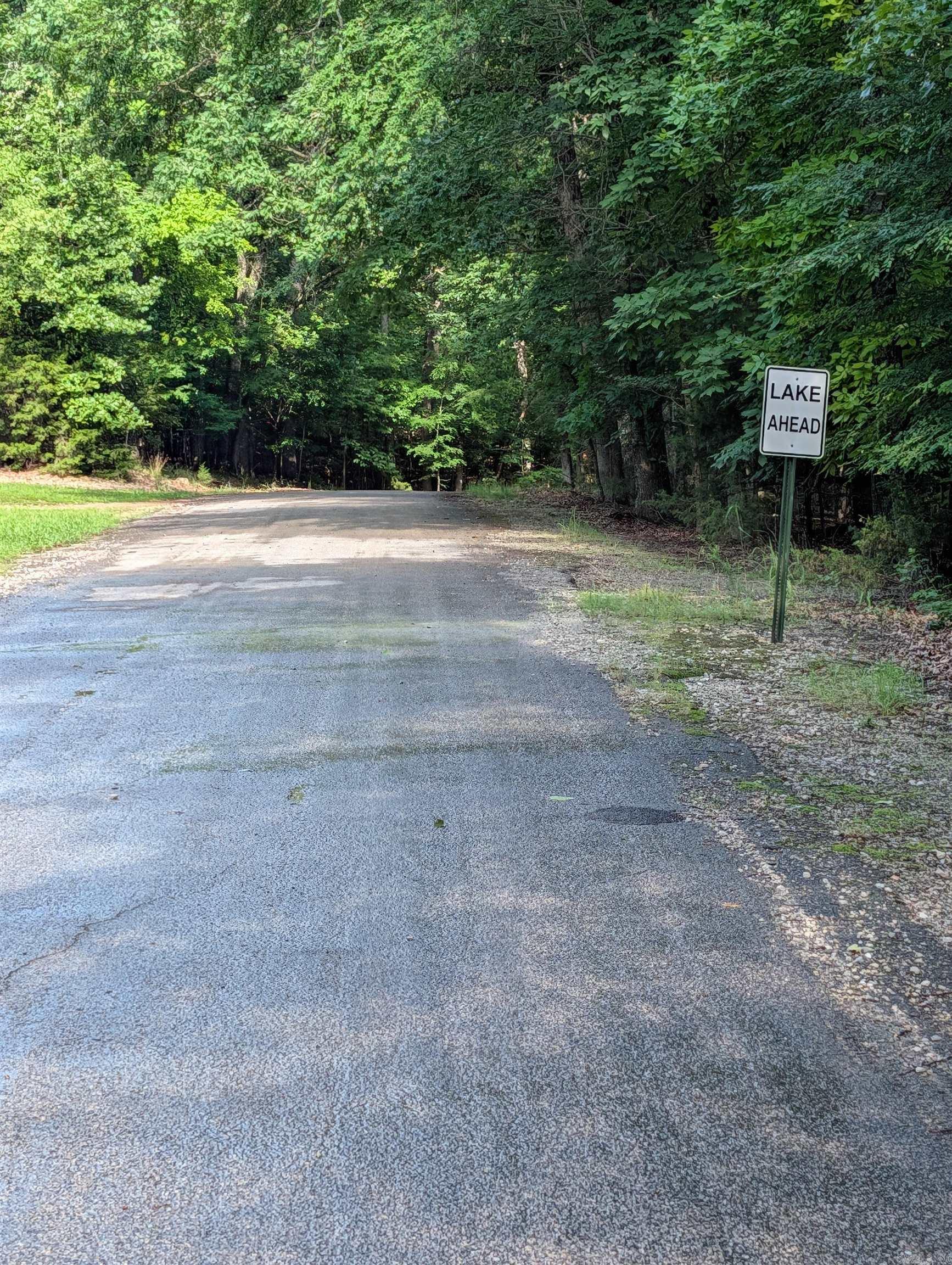 3 acres with Corps frontage on Bull Shoals Lake in Marion County, AR. Beautiful wooded tract offering privacy and a natural setting just a few miles from public lake access and boat launches. Electric available. Well and septic system will be required. Ideal location for a vacation retreat, cabin, or future dream home near some of the best fishing and boating in the Ozarks.
