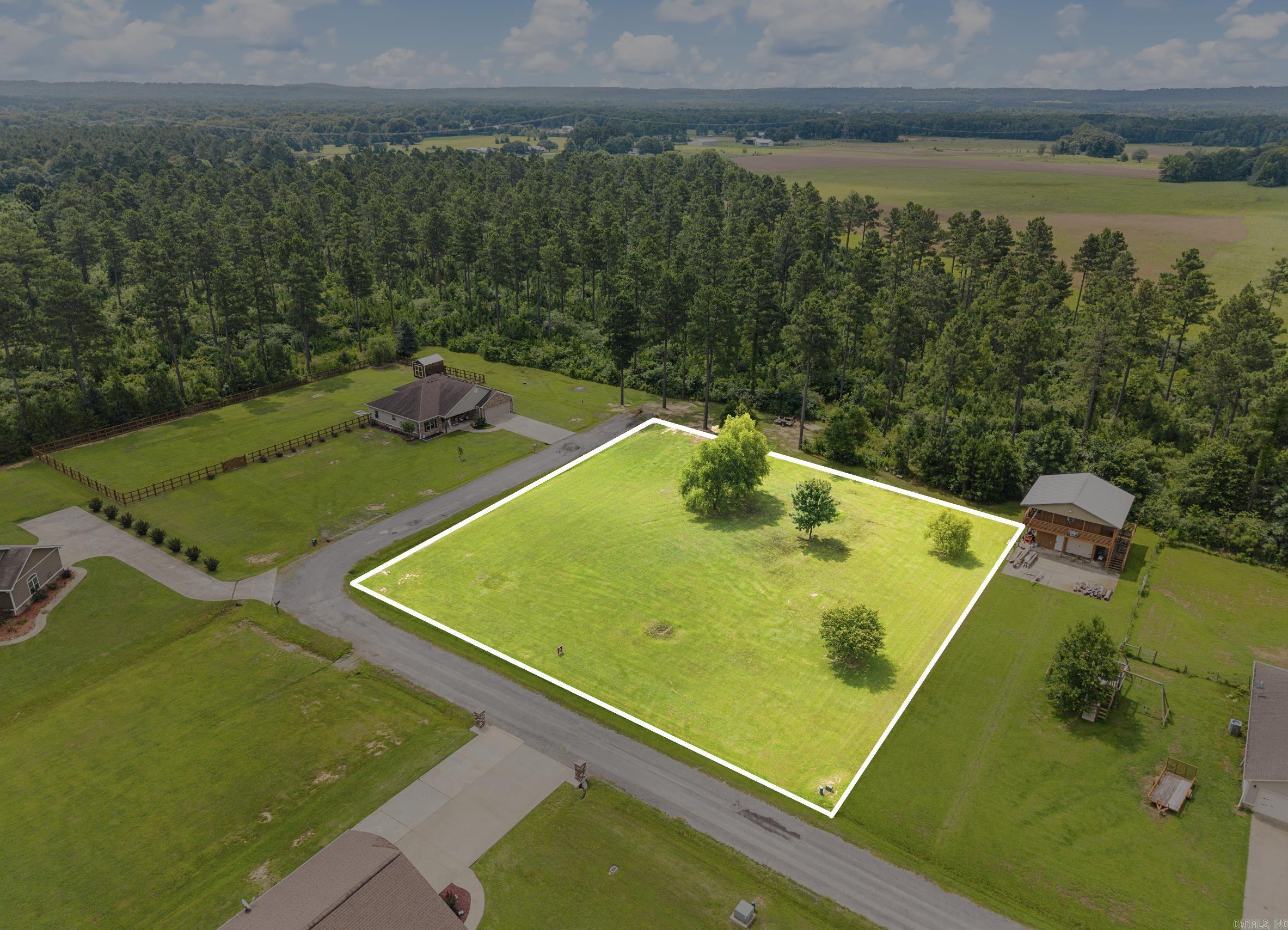 Build the home you've been dreaming about on this beautiful 0.76-acre level lot just outside Searcy. Offering plenty of space for a custom home, shop, outdoor entertaining, or a large backyard, this property provides the perfect balance of privacy and convenience. Enjoy the peaceful setting, scenic country atmosphere, and welcoming neighborhood while remaining only minutes from shopping, dining, schools, and everything Searcy has to offer. Utilities are nearby, and the level terrain makes this an excellent homesite. If you've been searching for room to spread out in a quiet location with great neighbors and a true country feel, this is a property you won't want to miss.