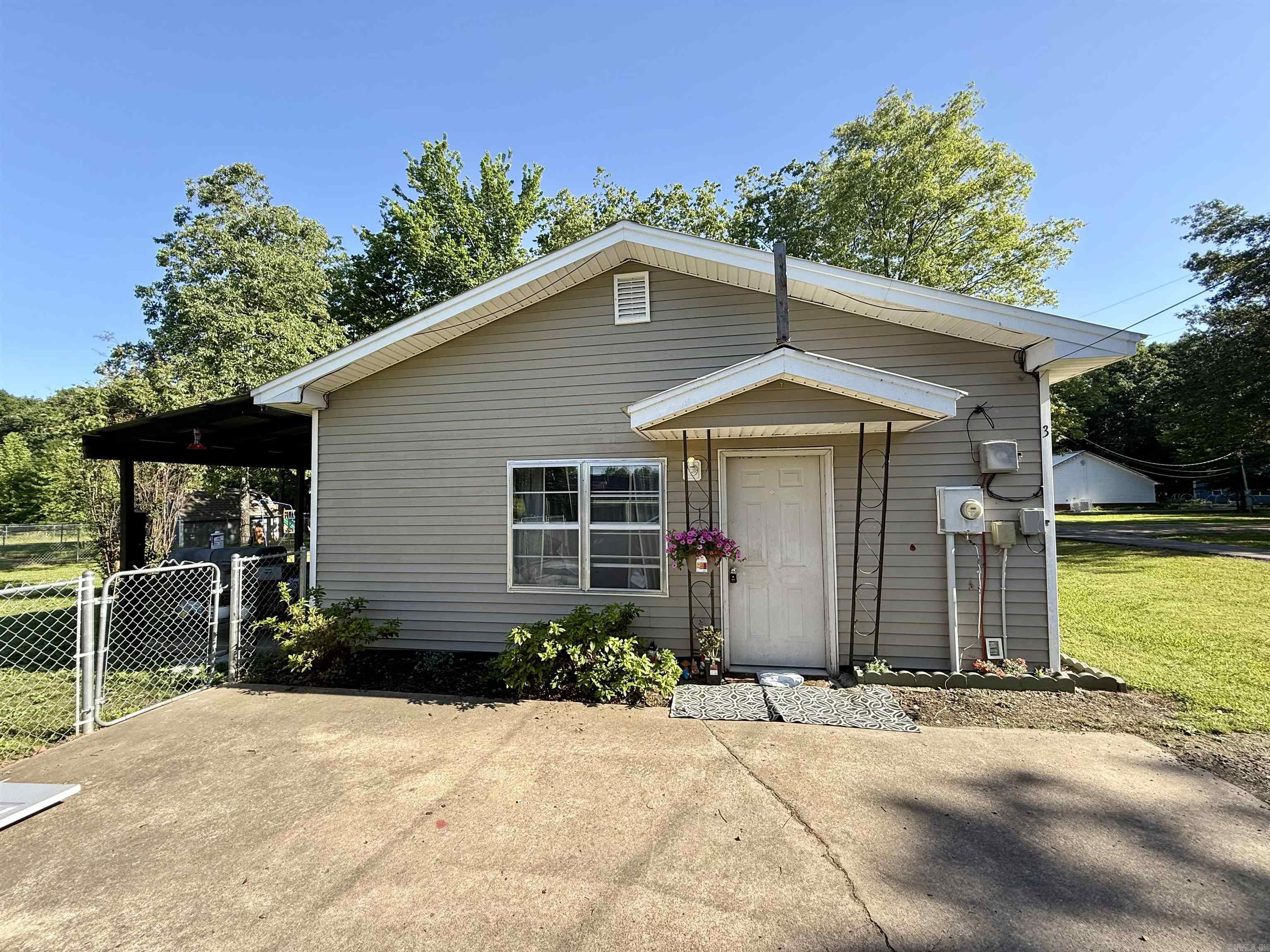 Charming 2 bedroom, 1 bathroom home located in a quiet area of Clarksville. Built in 1998, this well-maintained property offers 894 square feet of comfortable living space on approximately 0.23 acre. Features include low-maintenance vinyl siding, a durable metal roof, and a functional layout ideal for a starter home, downsizing opportunity, or investment property. Cozy and inviting with great potential, this home offers affordability and convenience in a desirable location.