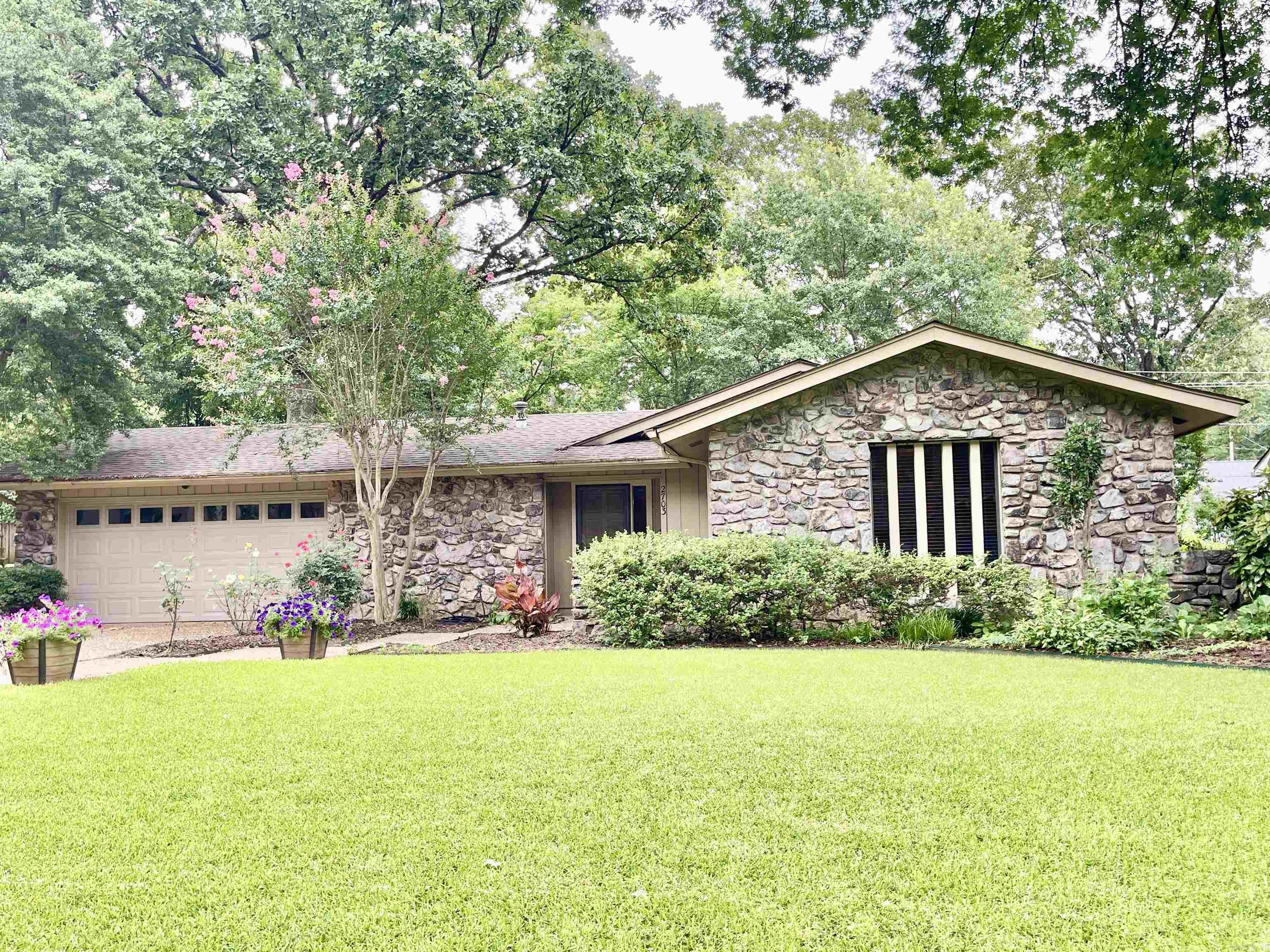 Talk about location, location, location!!! What an adorable home right in the middle of everything from the pool to the new pickleball court to shopping to groceries to restaurants!!! Beautiful majestic oak trees provide wonderful shade!  Swimming pool is just 3 houses down the street!! 3 Bedrooms 2 baths, Formal Living room and den! Nice dining area near the kitchen. Large laundry room has plenty of room for pantry items! Refrigerator, washer and dryer all convey to the buyers! Attic has 6-7 inches of insulation. New overhead door in garage only 1 year old! Heater and air conditioner only 3 years old. Also architectural shingle roof is newer. New patio doors have Low-E glass! Very nice backyard with 2 decks and a storage building! All this for under $260K!!! See Agent Remarks.