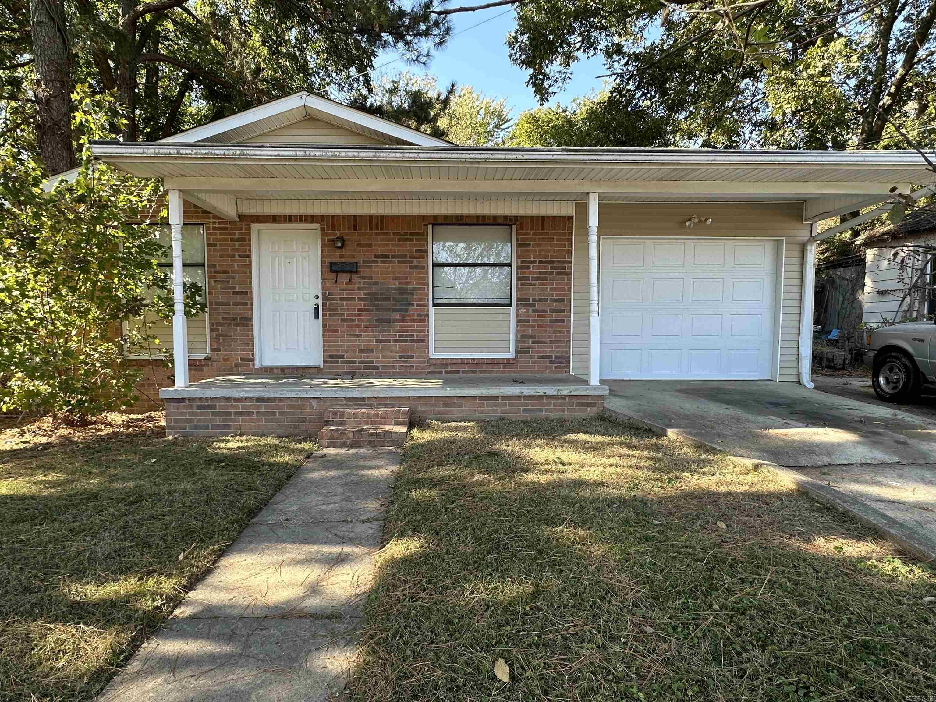 3bed/1.5 Bath 1170 Sq Ft home UNDER $120,000!! This humble abode is WAITING for you!! There are SEVERAL updates throughout this home including; new Garage door, freshly painted front door, stained concrete floors, bathroom vanities, among other things!! Open dining/living area, fully chain link fenced backyard... READY for NEW owners!!! Contact your favorite REALTOR to schedule a showing!
