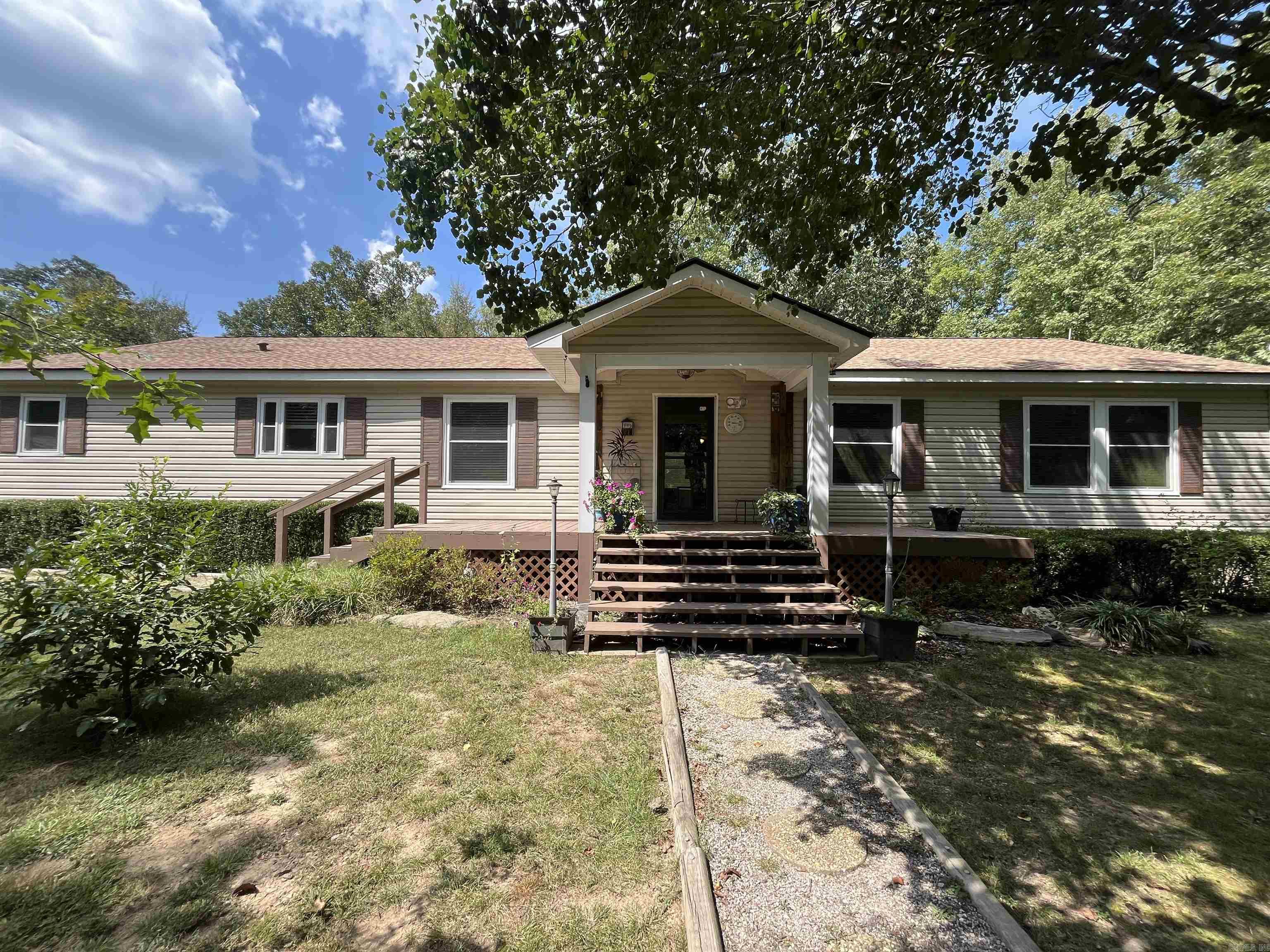 Well maintained 3 bedroom 2 bathroom on almost 3 acres! Two large outbuildings with electric to store all your toys! Sit on the back deck that over looks a creek and watch the wildlife. Right off the new extension of the bypass for quick access to all the amenities Hot Springs has to offer!