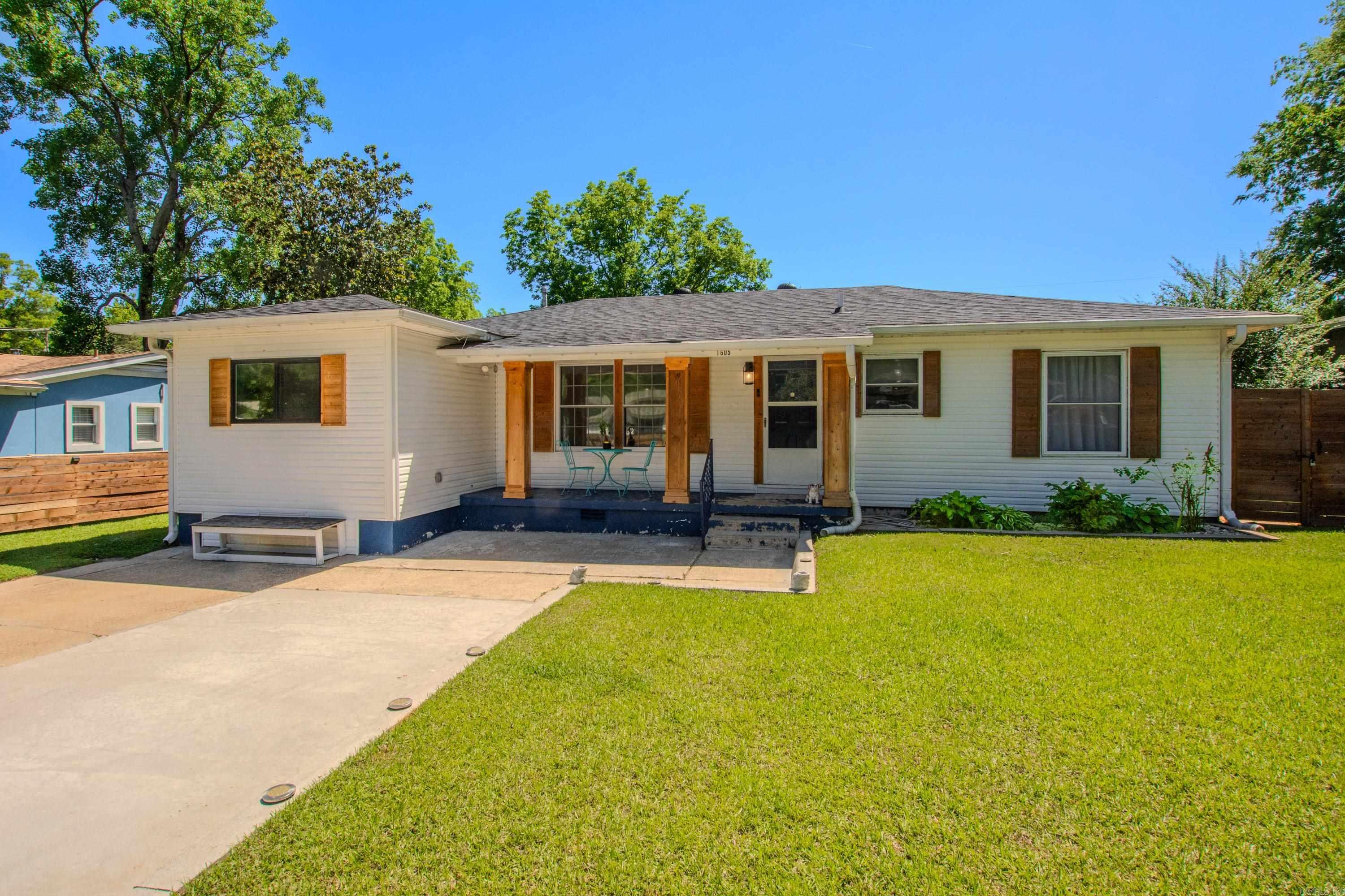 Get ready to fall in love! This stylishly updated home features a show-stopping kitchen with quartz slab countertops, built-ins and huge island with room for barstools! Nice dining room with lots of light! Master suite has a dreamy tiled walk-in shower! Updates include beautiful light fixtures and LVP flooring throughout! The amazing, custom wood fence with electric gate adds the perfect touch of privacy and convenience. Storage shed in private backyard! This one has all the vibes, come see today!  (Gas range will not convey, seller to replace with regular gas range)