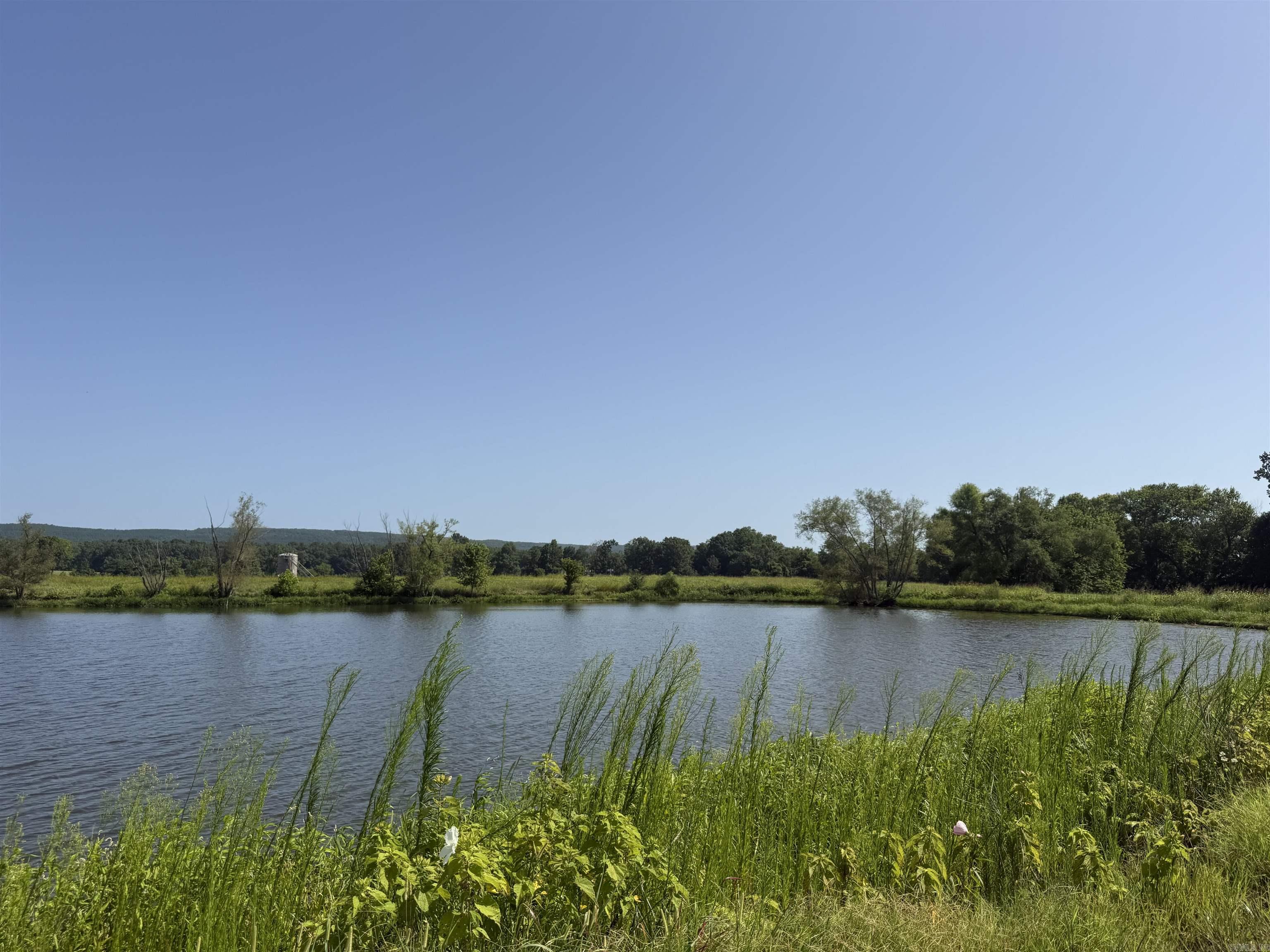 New Development inside the city limits of Heber Springs. River Wood Ranch has flat cleared lots and 19 lots along the river with trees. City sewer and water are available. Boat Ramp and Boat Dock will available by the first of 2027 for use by the residents of the subdivision. There are 8 lots that back up to the lake with views of the lake and Sugarloaf Mountain. Roads are currently gravel but as the lots are developed the roads will be paved.