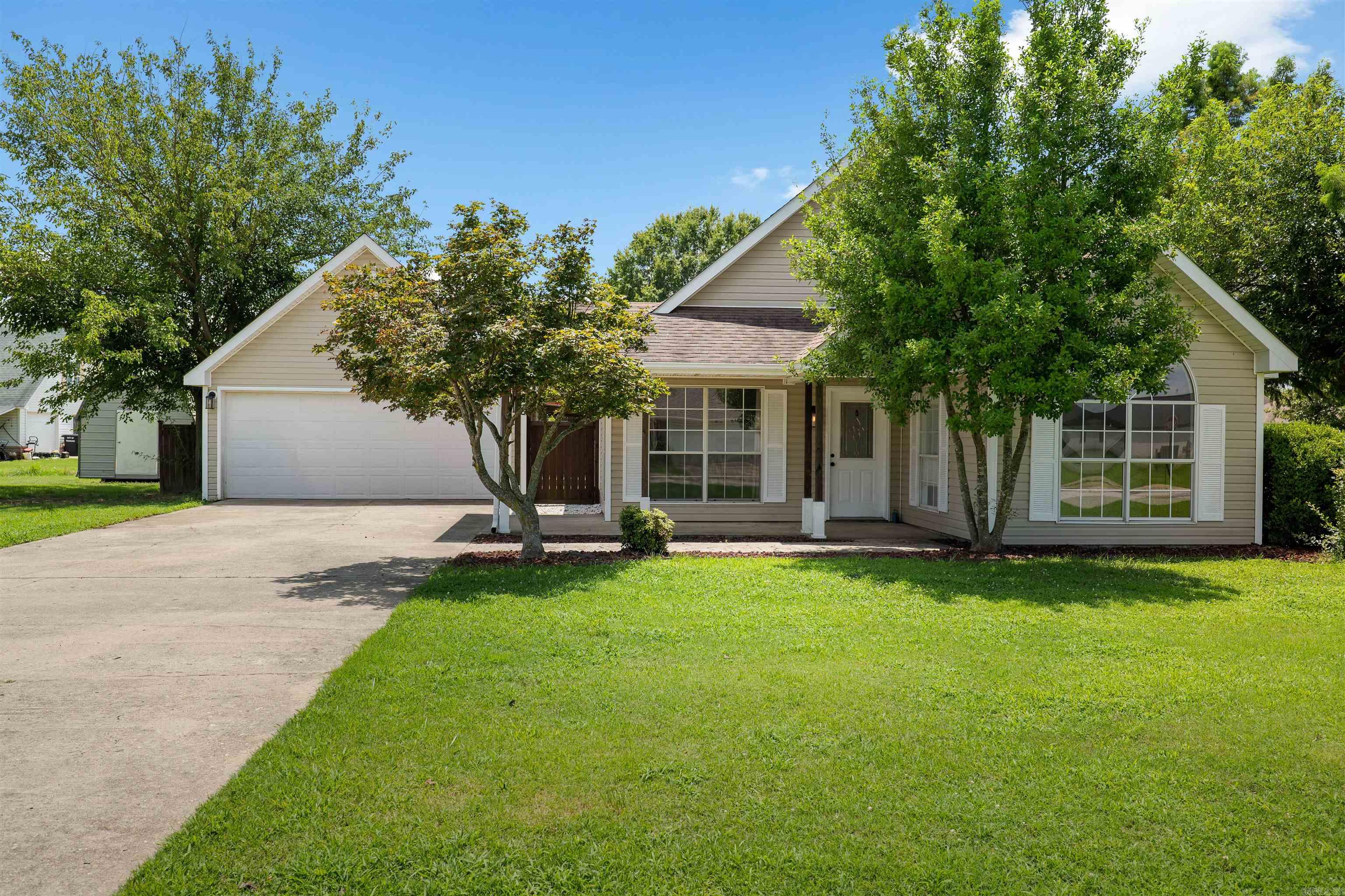 Welcome home to this well-maintained 3-bedroom, 2-bath home located on a desirable corner lot. Inside, you'll love the beautiful tile flooring that flows throughout the home, offering both style and easy maintenance. The functional floor plan provides comfortable living spaces perfect for everyday living. Step outside to enjoy the fully privacy-fenced backyard, ideal for relaxing, entertaining, or letting kids and pets play. A spacious 15x20 workshop/storage shed offers plenty of room for hobbies, tools, or additional storage, while the attached 2-car garage provides added convenience. Conveniently located in Trumann and move-in ready, this home offers the perfect blend of comfort, functionality, and curb appeal. Don't miss your opportunity to own this wonderful home—schedule your private showing today!