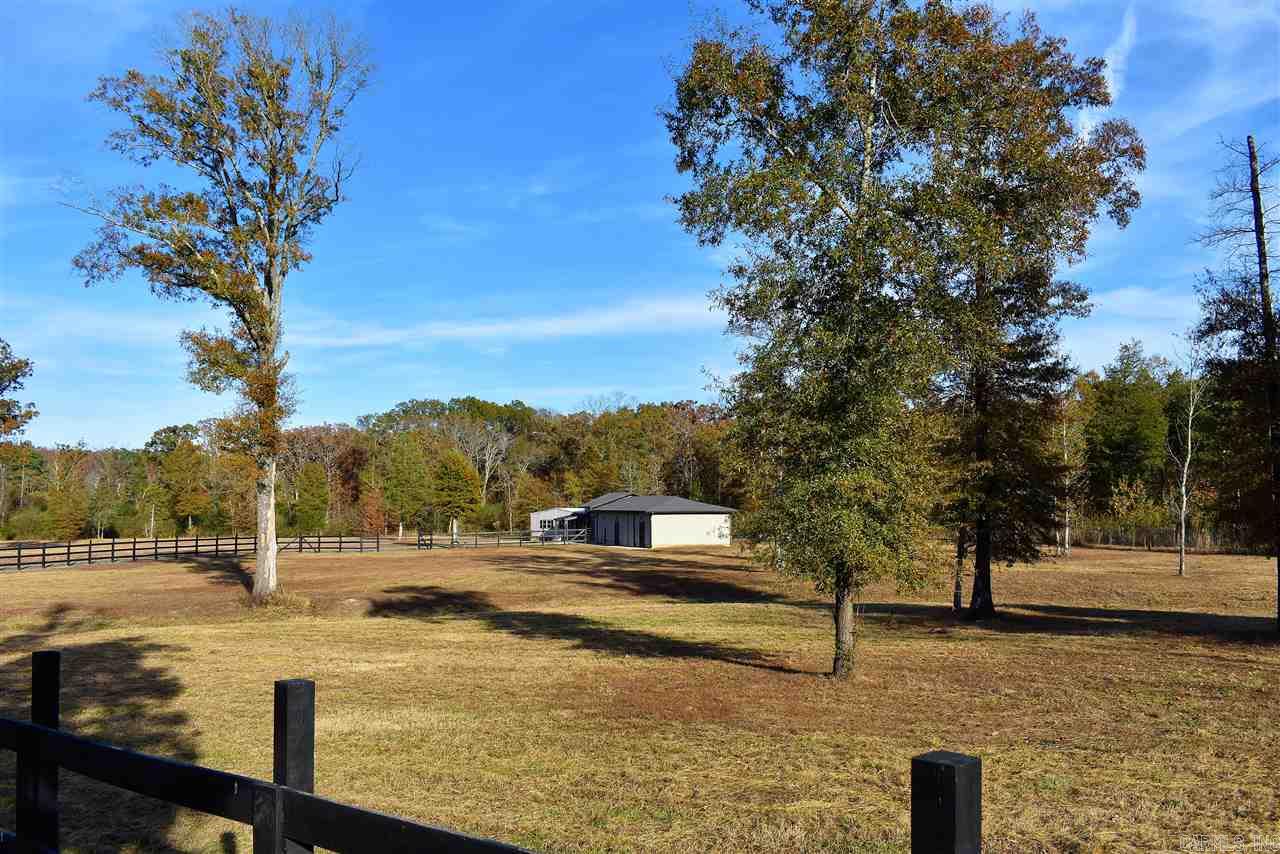 35 Gorgeous acres just off Hwy 5 near Cabot at the edge of North Pulaski Co. This property is "HORSE FARM READY". Very clean and well maintained structures include: horse stalls, tack room, shed, plus 2 Heated and cooled office space. rest rooms. Beautiful landscape. Predominantly level. Perfect place to build your dream home in the country. Private. Fenced. Minutes to town. Fabulous ranch potential. Lock box on gate for access. Call CSS for appointments.