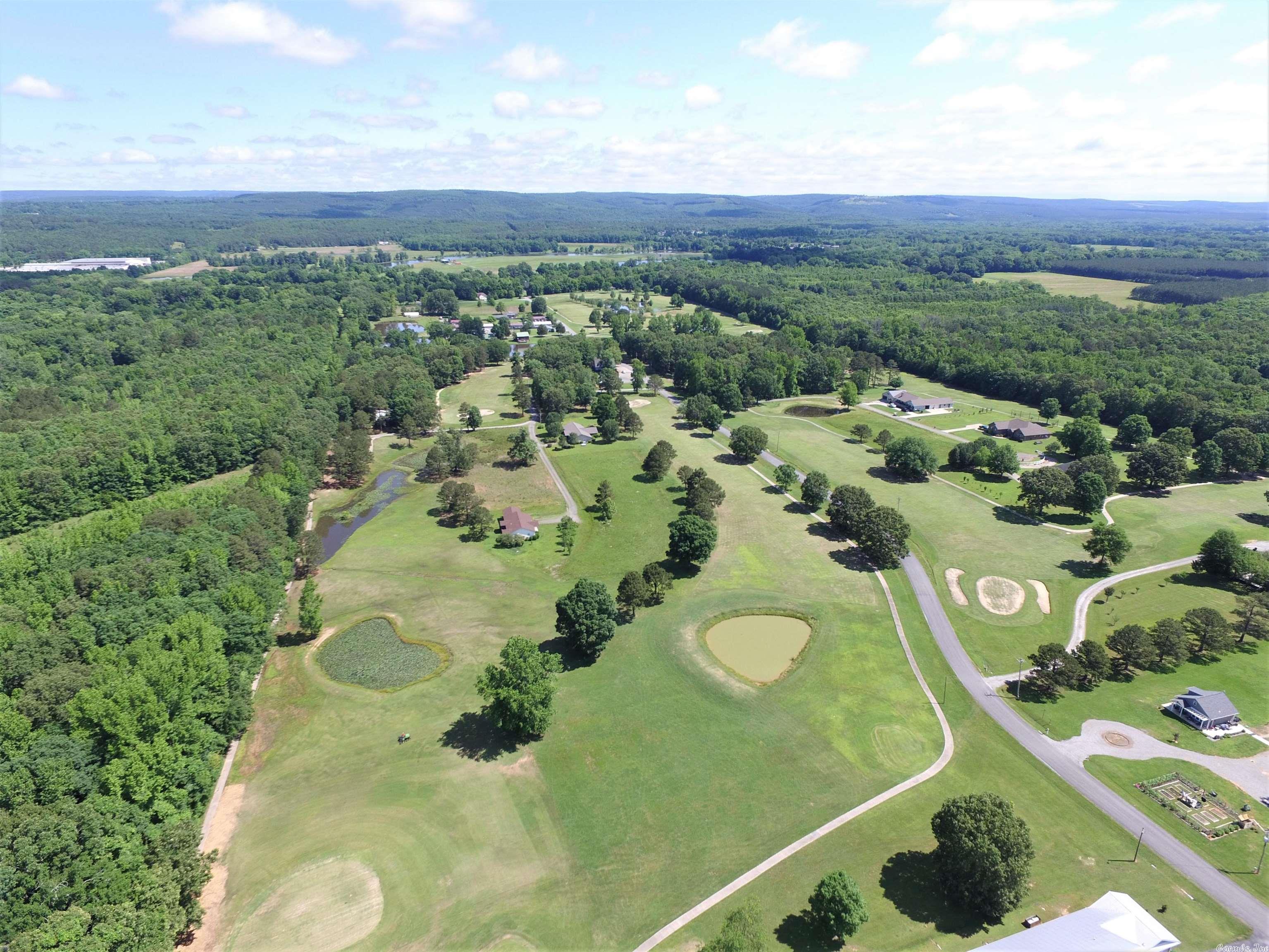 Outstanding investment opportunity! 19 rental units in Heber Springs! 9 duplex buildings each with two, two bedroom units and one three bedroom cabin. Riverland Country Club, complete with nine hole golf course and private club with liquor license will also convey. Golf course may be repurposed for residential development. No minerals convey.