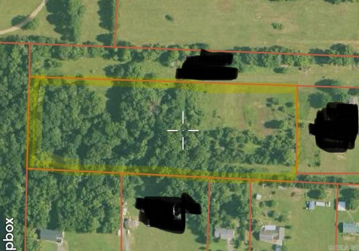 Discover the perfect blend of privacy and potential with this beautiful 8.00-acre tract located in the desirable Joan Community near Arkadelphia, Arkansas. Offering a mix of mature timber and open pasture, this property provides an ideal setting for your dream home, mini farm, or recreational retreat.  The land has already been prepped for your plans with a recent perc test completed, and designated areas for fill lines and septic tank placement clearly marked—saving you time and money as you get started. Utilities are conveniently available at the road, making the building process even more accessible.  Enjoy the peace of country living while still being just a short drive from Arkadelphia amenities. Situated within the Arkadelphia School District, this property offers both convenience and a great location.