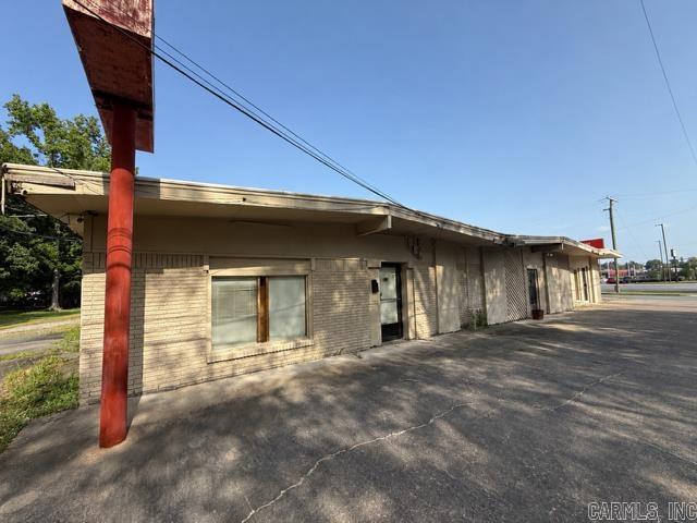 Prime commercial opportunity in the heart of Pine Bluff! This versatile property offers exceptional visibility with a high traffic count and endless possibilities for investors or business owners. Designed with flexibility in mind, the building has the potential to accommodate four separate rental spaces, creating multiple income-producing opportunities. Whether you're looking to expand your portfolio or establish a new business location, this property is ready to meet your needs in a thriving commercial area.