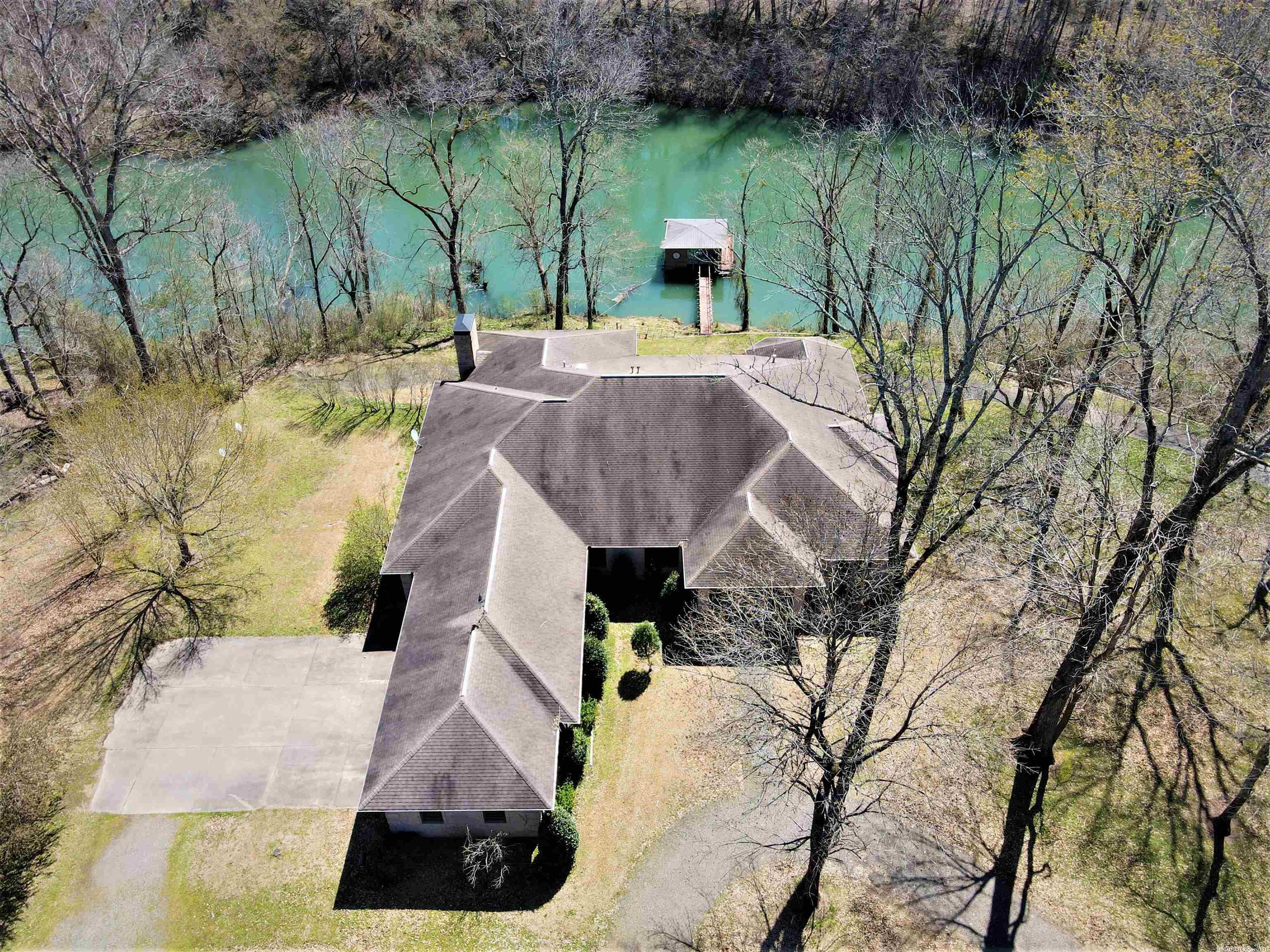 PRICE REDUCED! The word mansion is defined as "a large, impressive house" and I assure you this home will not disappoint. The immaculate 10,624 ft2 home sits on 54.02 surveyed acres w/ 1,680.29' of Little Red frontage. Perfect for hosting your family gatherings, purchase as a corporate retreat, or rent as a luxury airbnb/VRBO. Listed well below other recent river front sales on a square foot basis. 7 bedrooms (6 with private, full baths), sewing/craft room, huge pantry, boat dock, large shop.