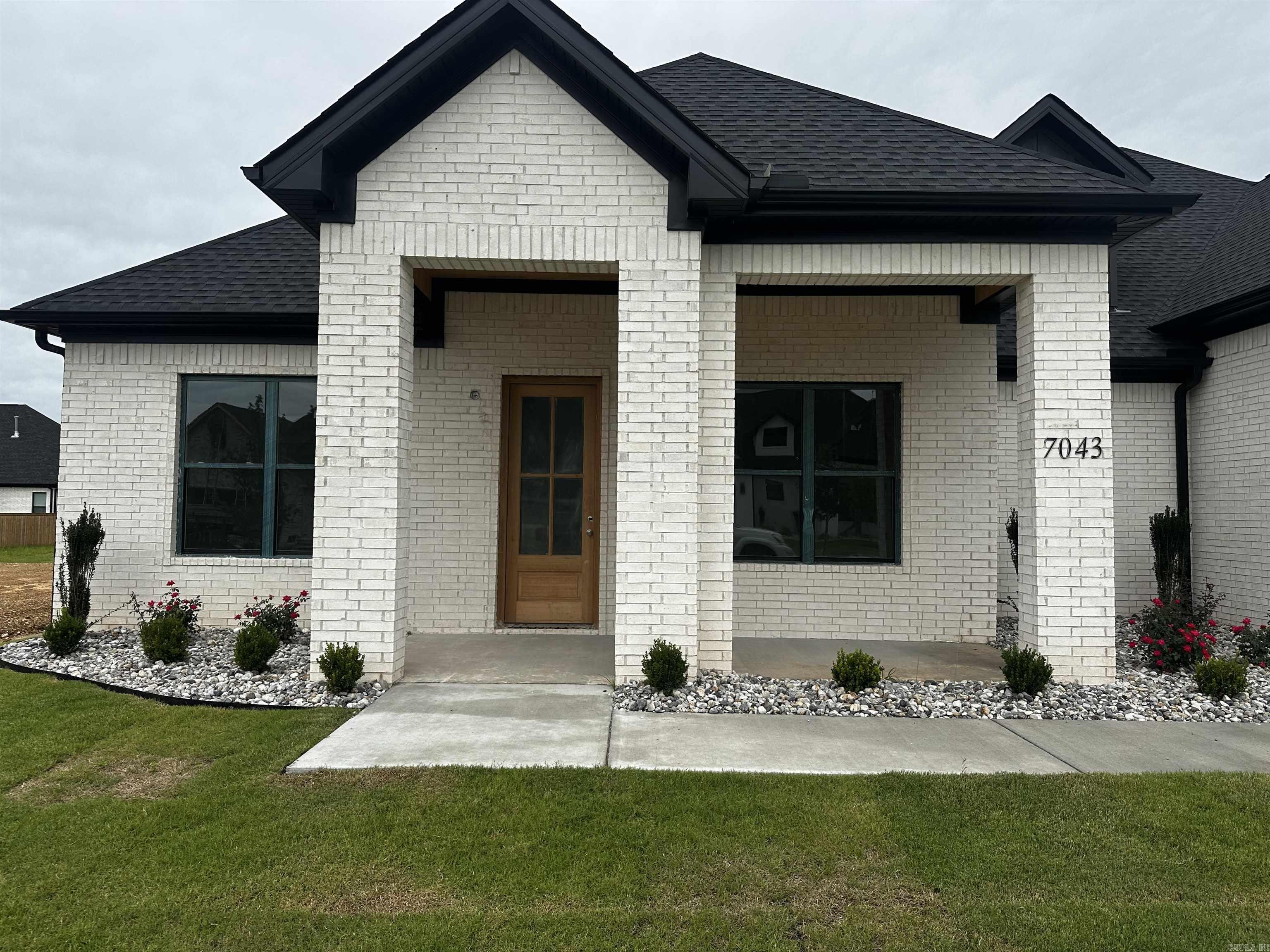 Welcome home to this stunning new construction an all brick beauty in highly sought-after Hurricane Lake Estates. Featuring 4 bedrooms, 3.5 bathrooms, and thoughtfully selected finishes throughout, this home blends convenience and quality living.  Inside, you’ll find an inviting open layout with a beautiful gas fireplace, quartz countertops throughout, and tasteful designer touches that create a warm, elevated feel. The spacious kitchen and living areas are designed for both everyday living and entertaining. Oversized walk in pantry complete with outlets so all of those small appliances have a designated space.   Enjoy all that Hurricane Lake Estates has to offer, including swimming pools, tennis courts, pickleball courts, and more. This is a wonderful opportunity to own a gorgeous new home in one of the area’s most desirable communities.