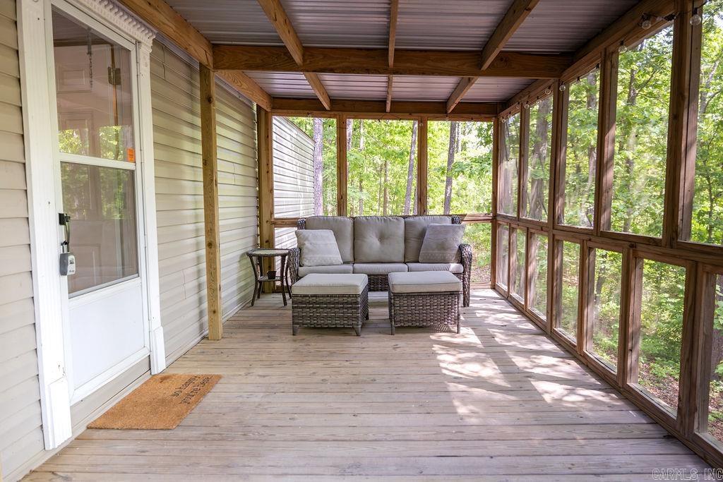 Welcome to 74 Rocky Ridge Road. This is the perfect lake get-a-way with privacy. This home is very clean and comes fully furnished.  It has a 12x24 screened in porch and is a golf cart away to the marina and boat launch.