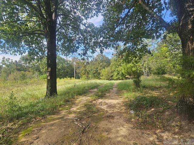 **Attention Investors & Developers!** This **11.03-acre**property, consisting of Lots 16, 17, & 18 in Fox Run Subdivision, is packed with potential and ready for your next project. The property also includes a 2-bedroom, 1-bath mobile home, offering immediate rental potential or a place to stay while you develop. Located in an already established subdivision with **no restrictions**, it's an excellent opportunity for a mobile home park, RV park, rental development, or even a private retreat. The property includes multiple electric meters, multiple water meters, and wells already on site, giving you a great head start. Tucked away in a peaceful, secluded setting yet only **10 minutes from town**, it offers the perfect balance of privacy and convenience. Being sold **AS-IS**, and utilities will need to be inspected. Don't miss this incredible investment opportunity with endless possibilities!